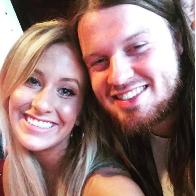 One of our favorite selfies, taken in a seafood restaurant on a beach weekend in August 2018 with some great friends.
