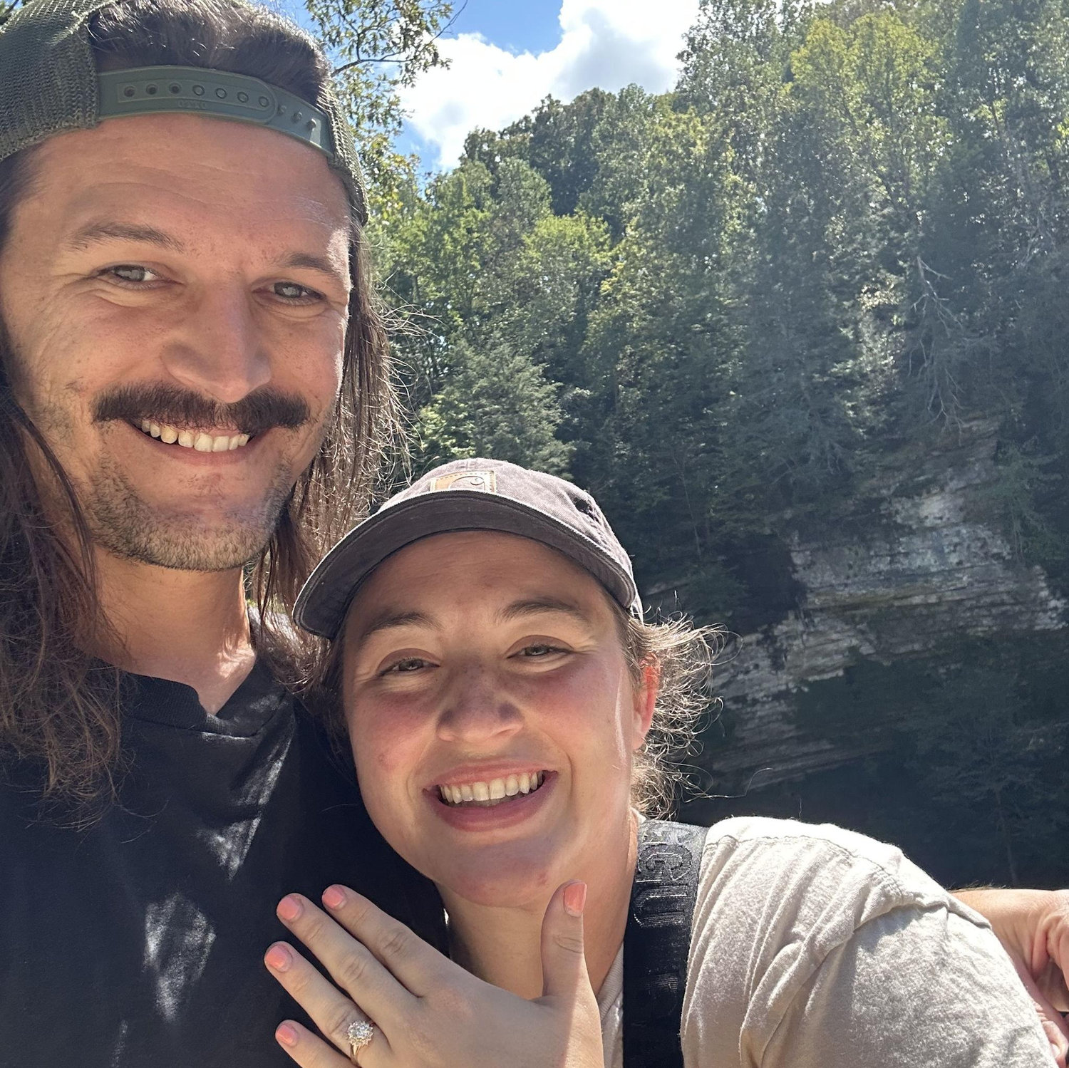 Travis proposed while Travis and Virginia hiking at Cummins Falls in Tennessee.
