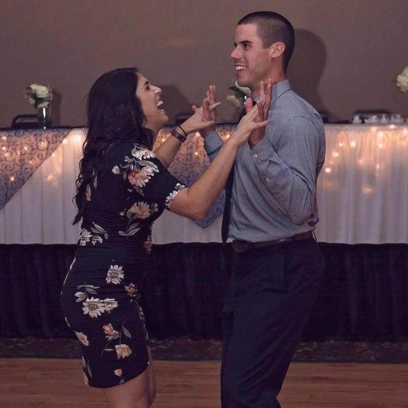 Our first wedding together, teaching Kurt polka... or trying