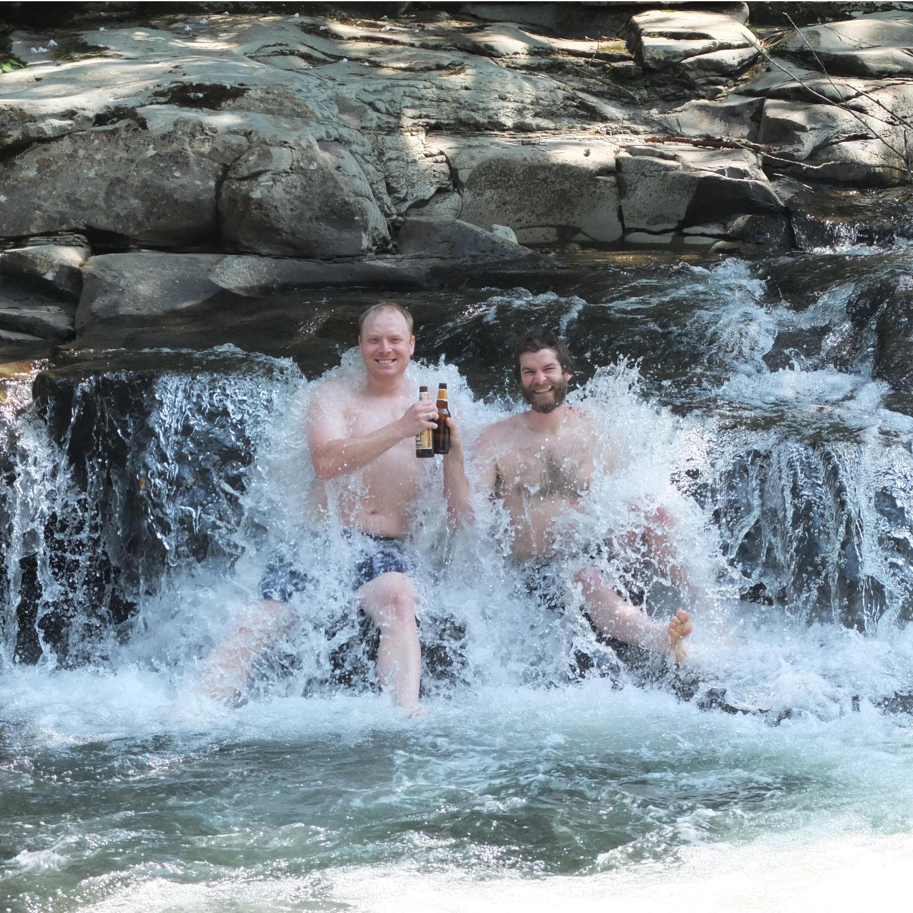 Kris and his brother Justin sharing some beers in the currents of "Mules hole"