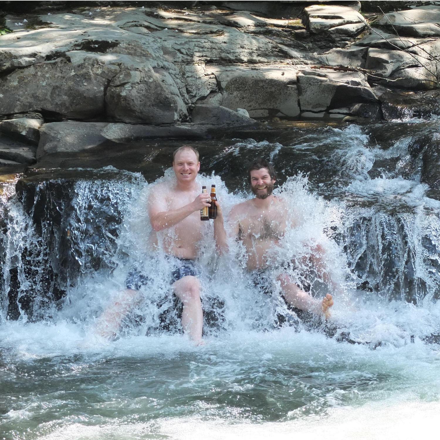 Kris and his brother Justin sharing some beers in the currents of "Mules hole"