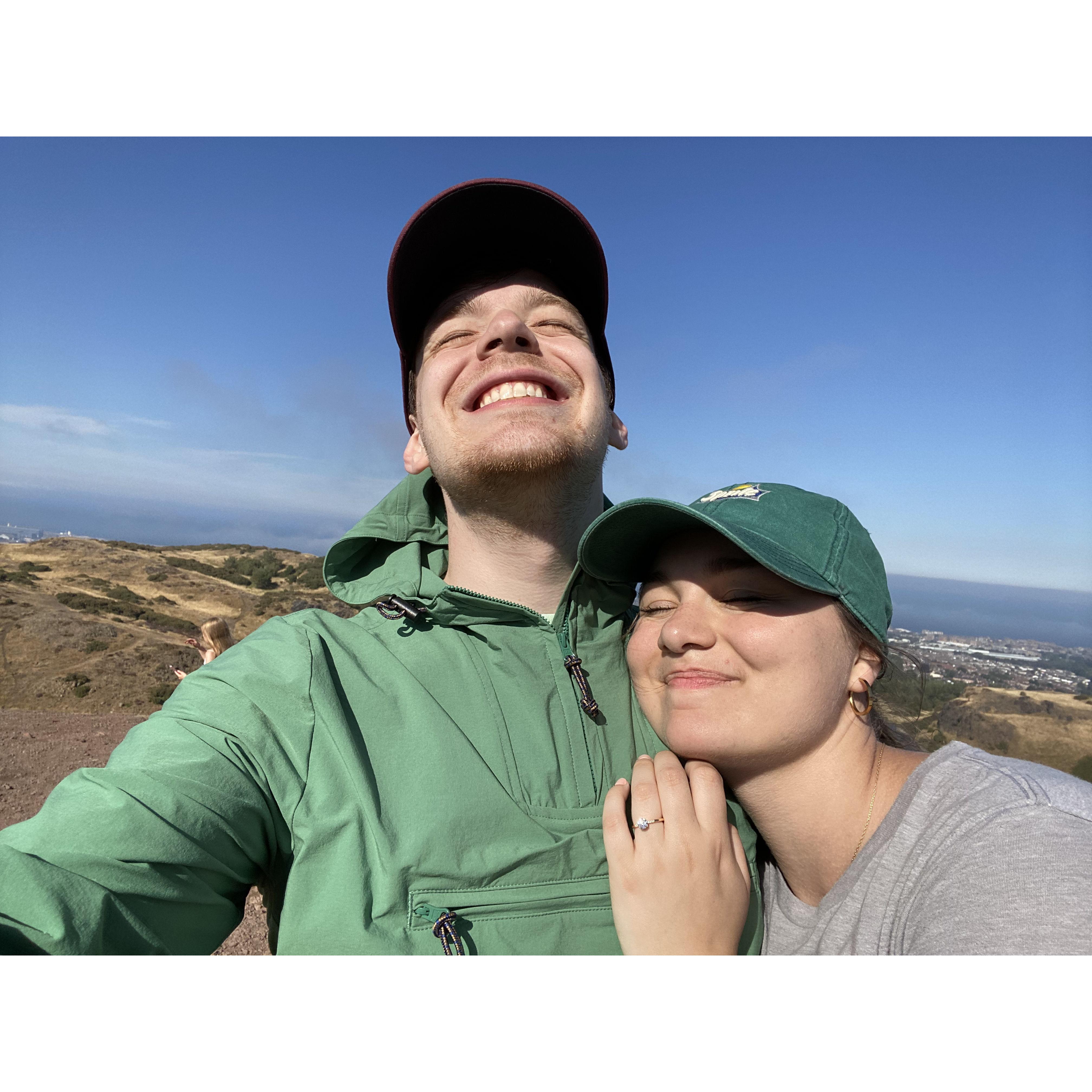 On the top of Arthur's Seat in Edinburgh, Scotland! The day after we got engaged  :)