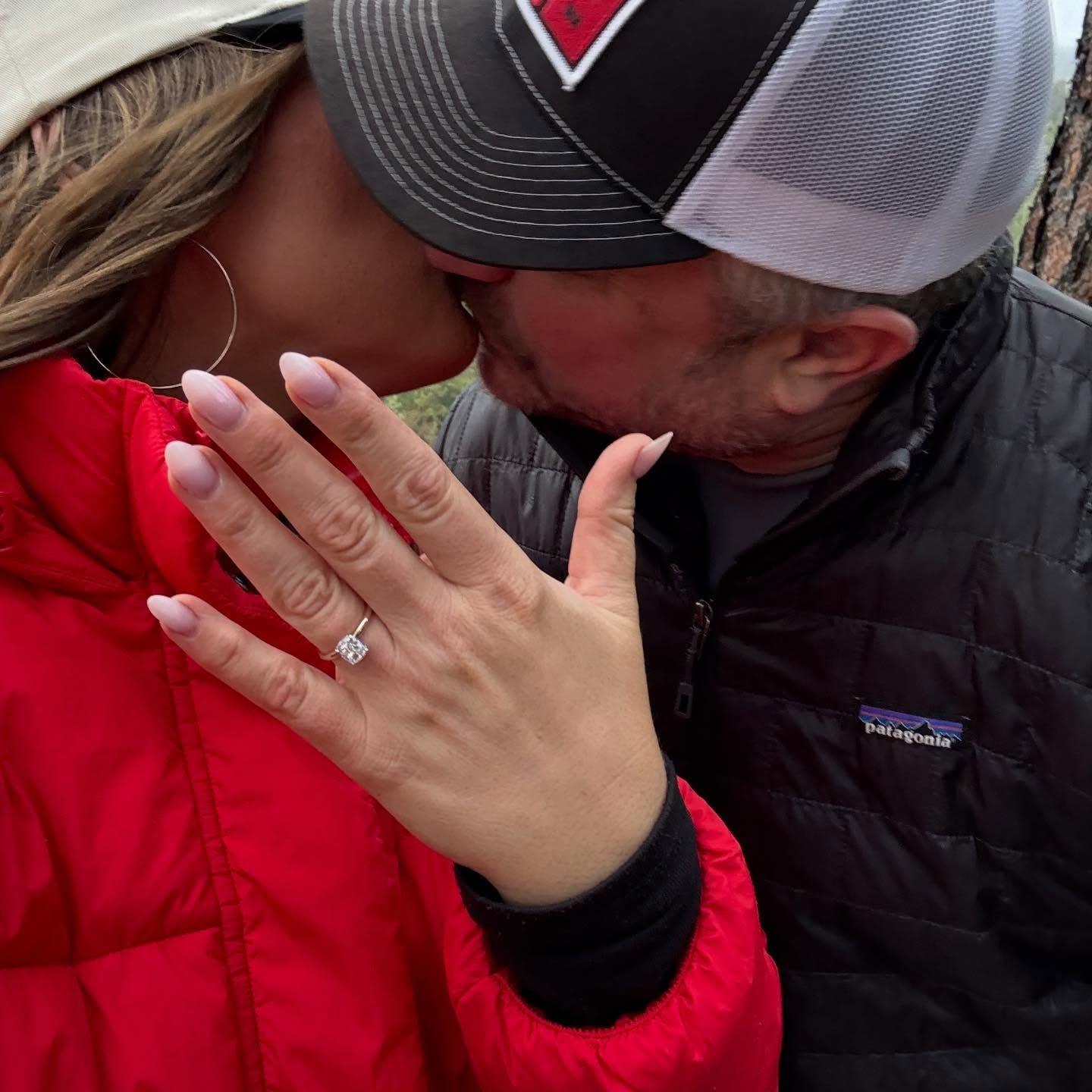 Before proposing, he told me he loved me and when I said it back he looked at me and said, “Enough?” and when I said yes he  got on his knee and proposed.