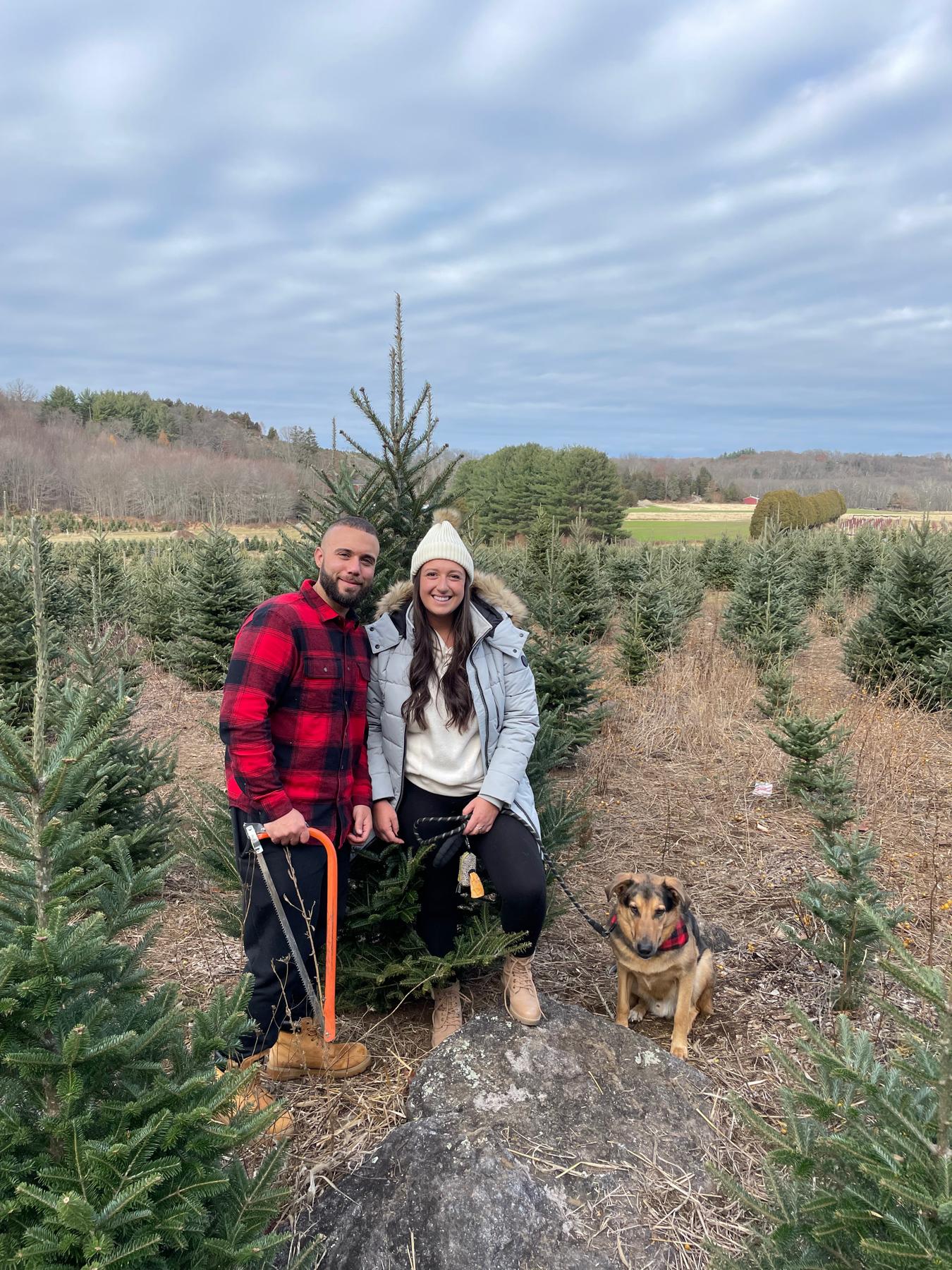 Cutting down our first Christmas tree together with Jimmy Dean!