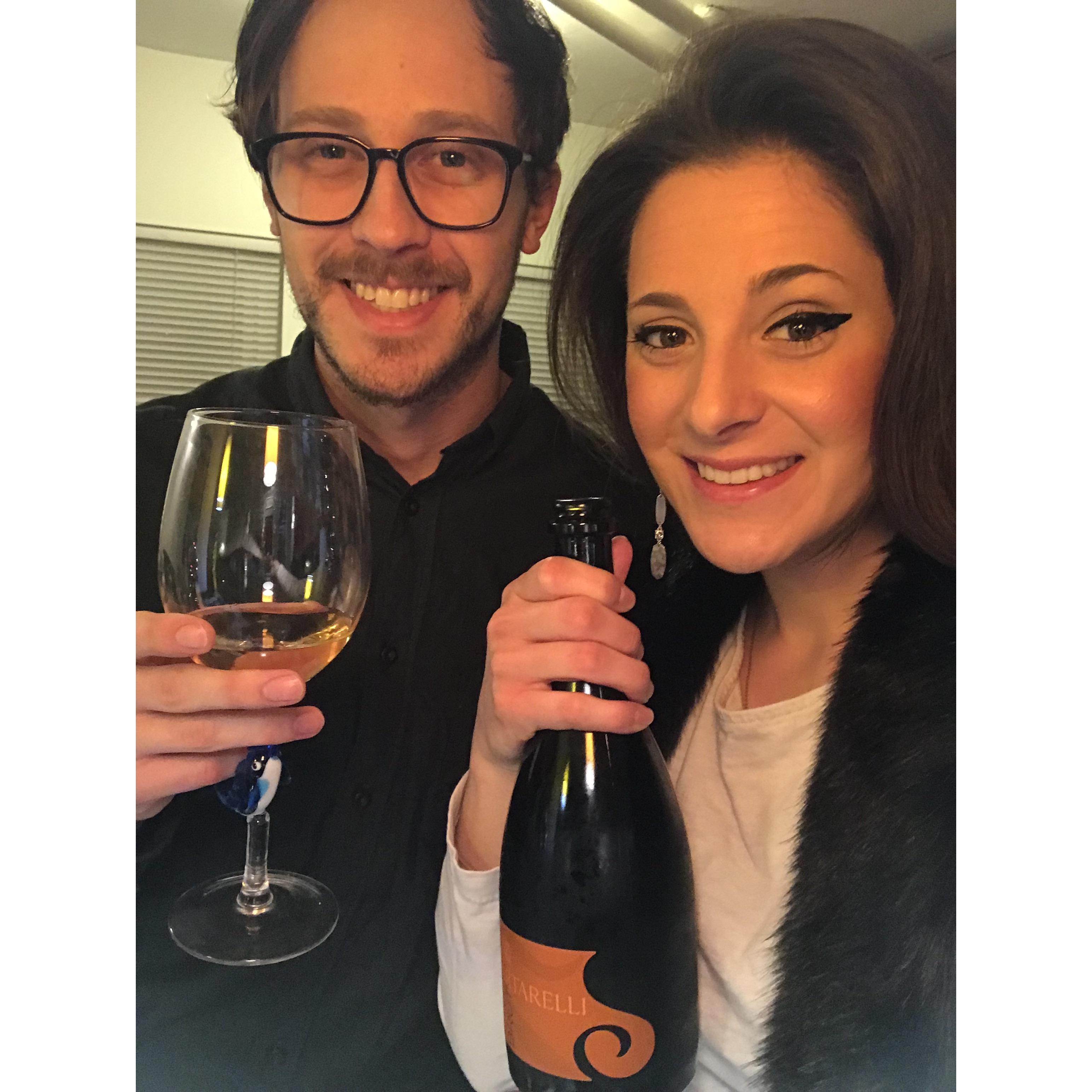 We are drinking white wine. We are in Caroline's old apartment. We nicknamed it "The Shed".