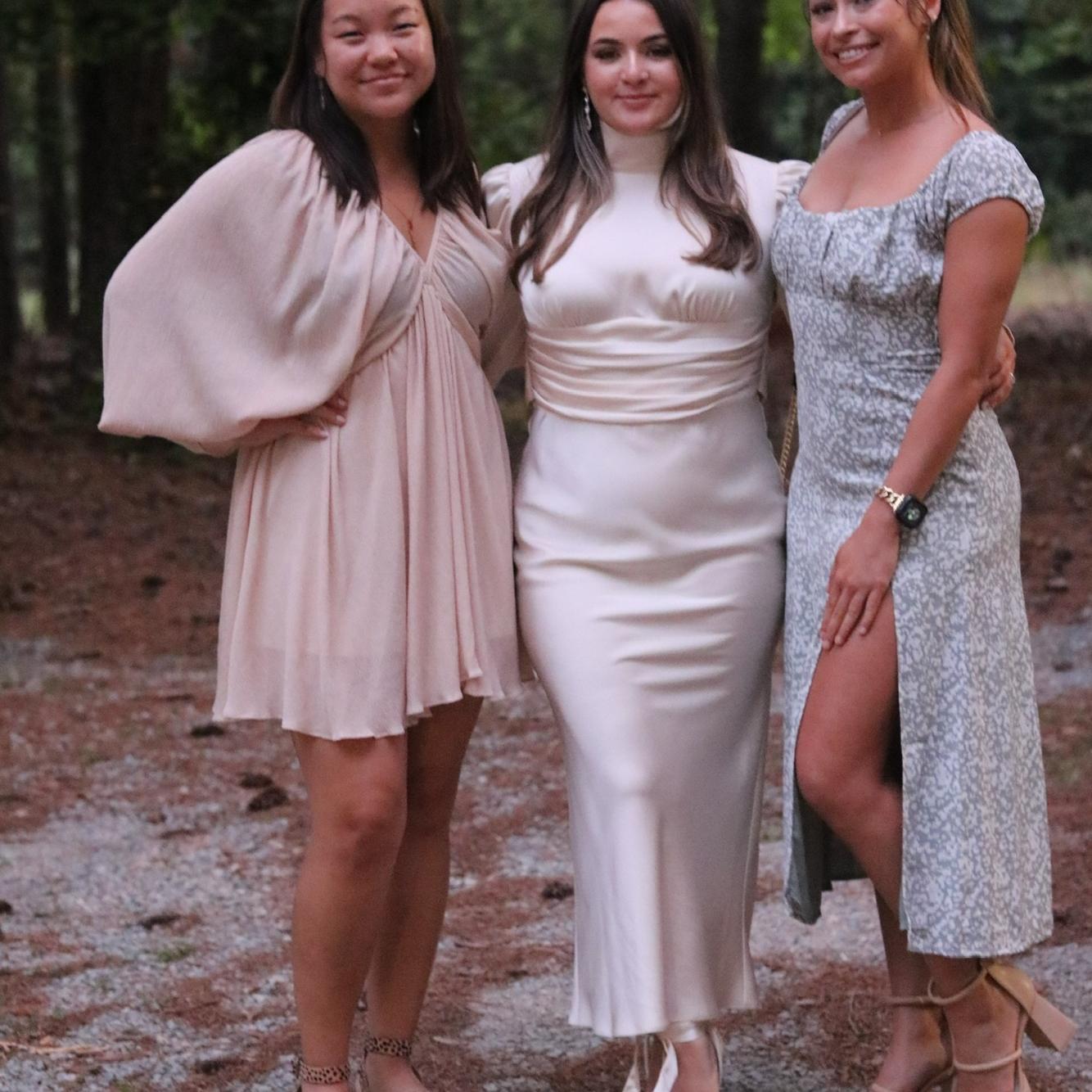 Maddie Caviness (Bridesmaid) and Angelica Hadden (Friend of the bride and Wedding Cake Baker)
