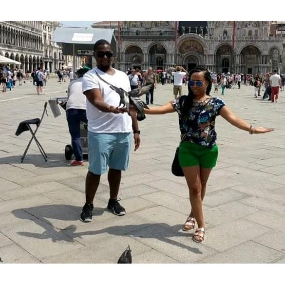 Feeding the birds in San Marco Square in Venice