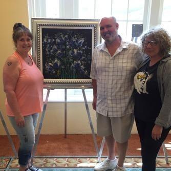 We were bit by the art bug on our Cruise in Jan. 2018. This was taken in Galveston at an art auction where we met this wonderful artist and won the bid on this beautiful original piece.