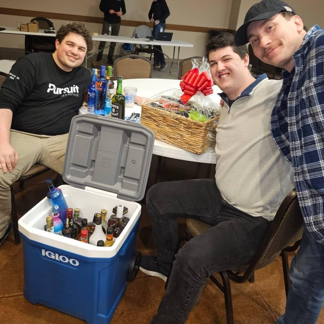 Patrick with groomsman Brian and Tyler after winning a cooler of booze