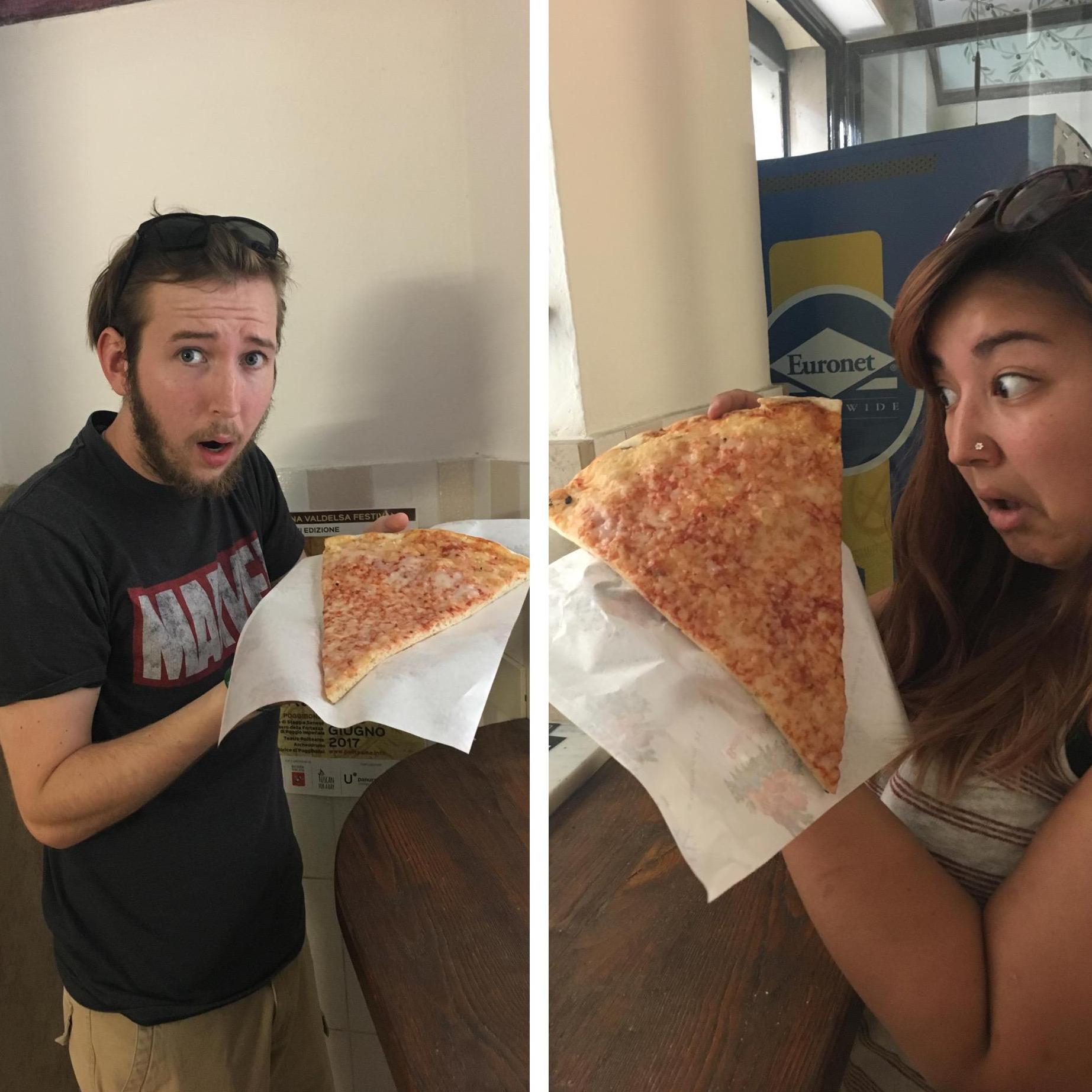 Eating giant delicious pizza slices in Siena, Italy