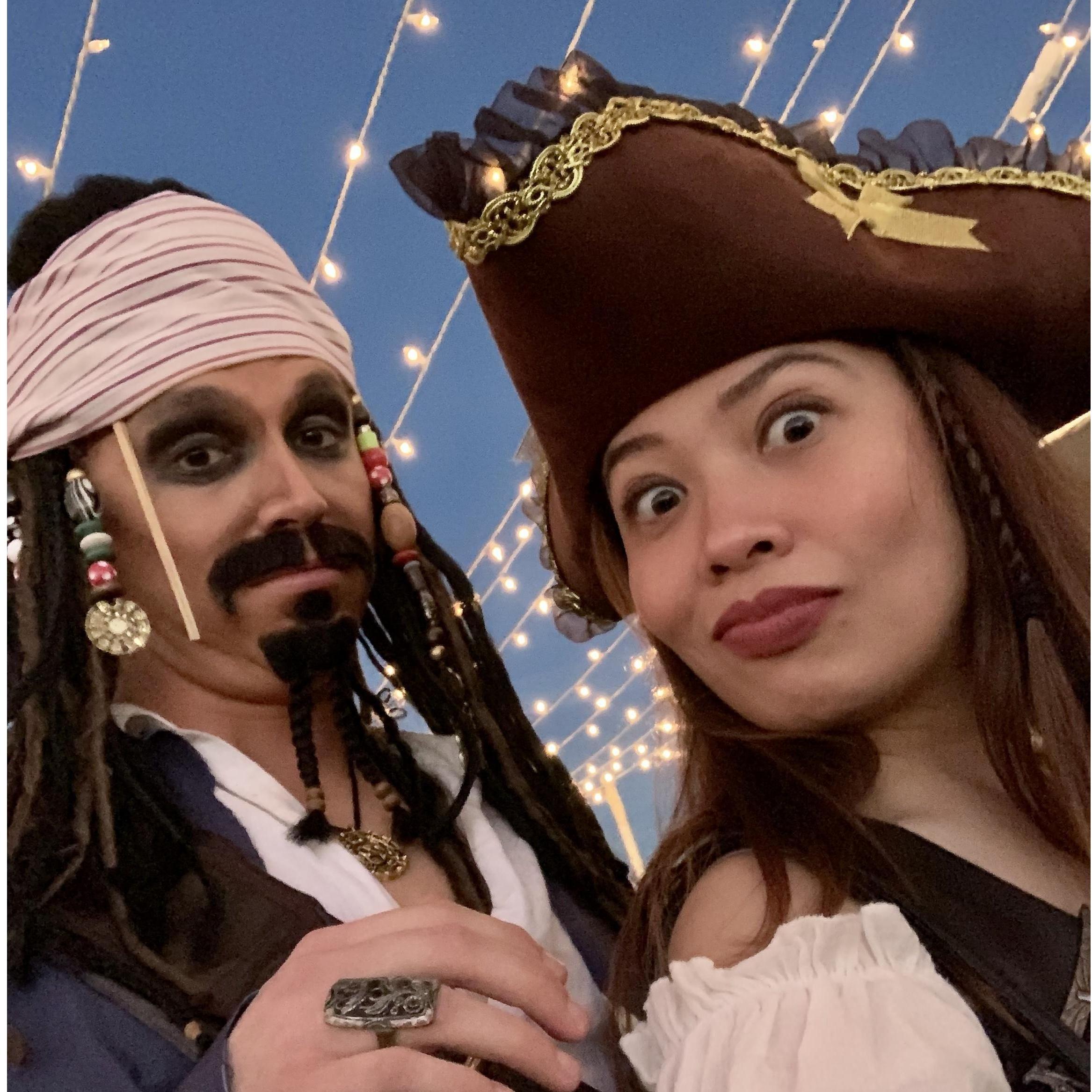 Swashbuckling on a sailboat together as pirates.