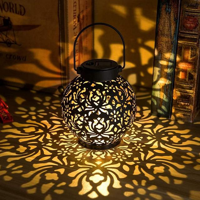 2 Pack Outdoor Solar Hanging Lantern Lights Metal LED Decorative Light for Garden Patio Courtyard Lawn and Tabletop with Hollowed-Out Design. 2 Color Options Black and Bronze.