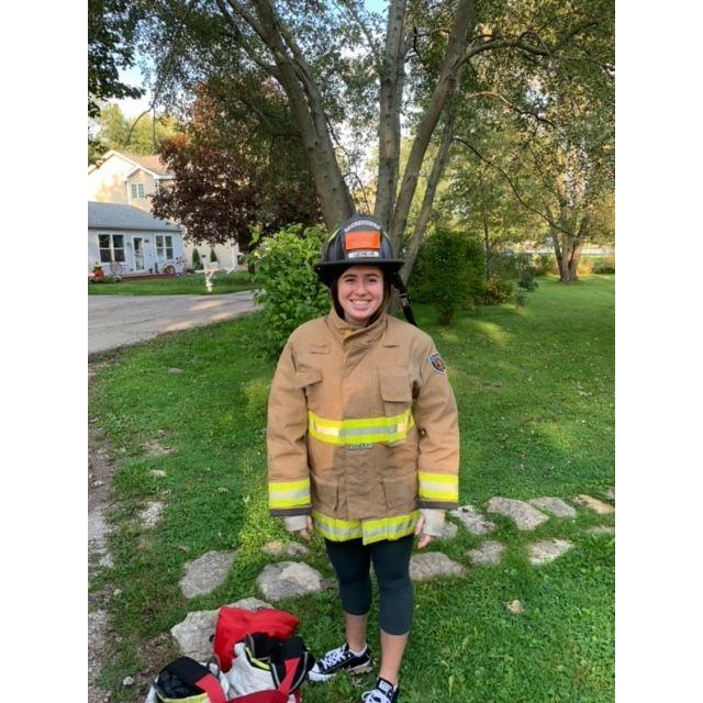 Wearing Ryans firefighter gear