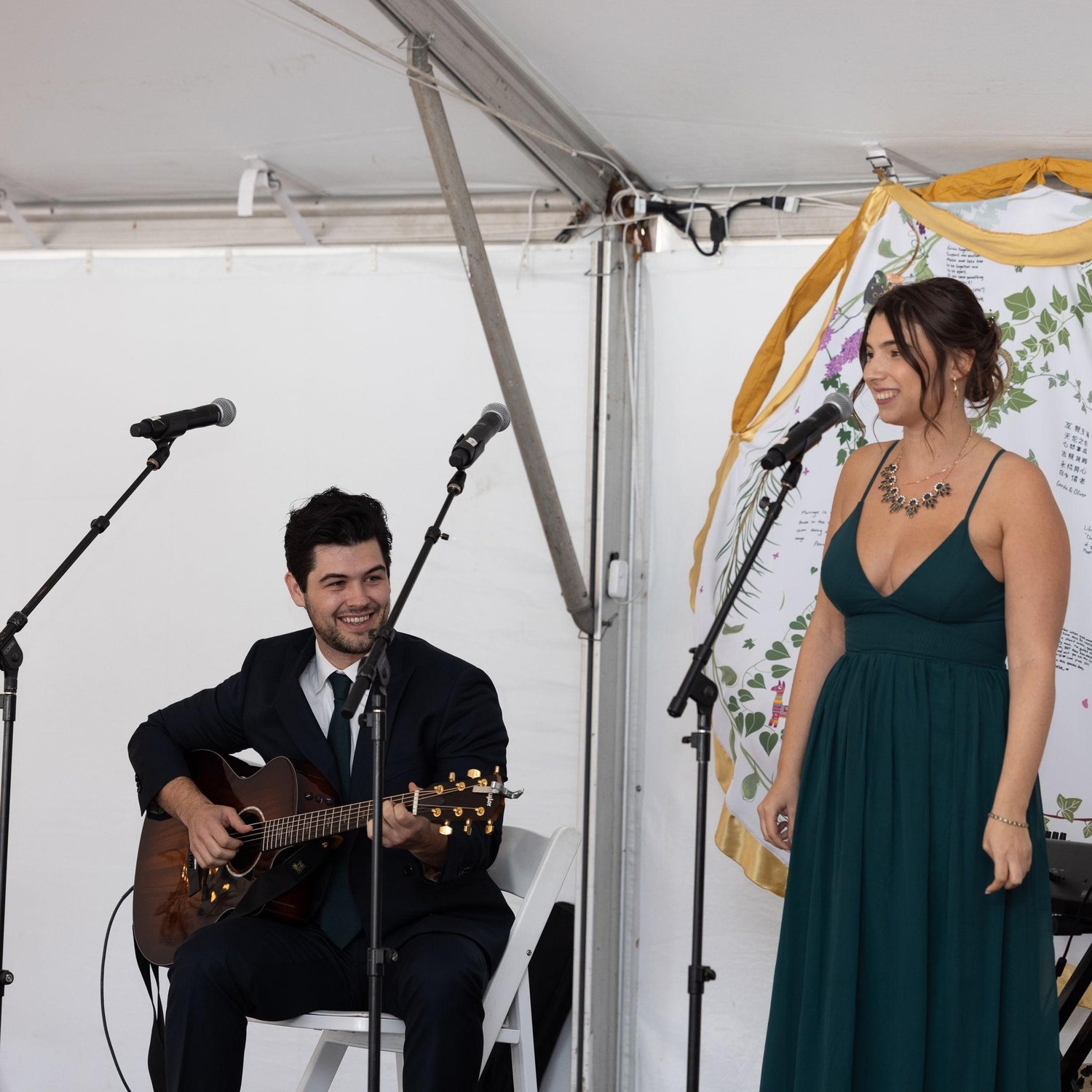 Performing "I'll have to say I love you in a song" together at Miranda's sister's wedding