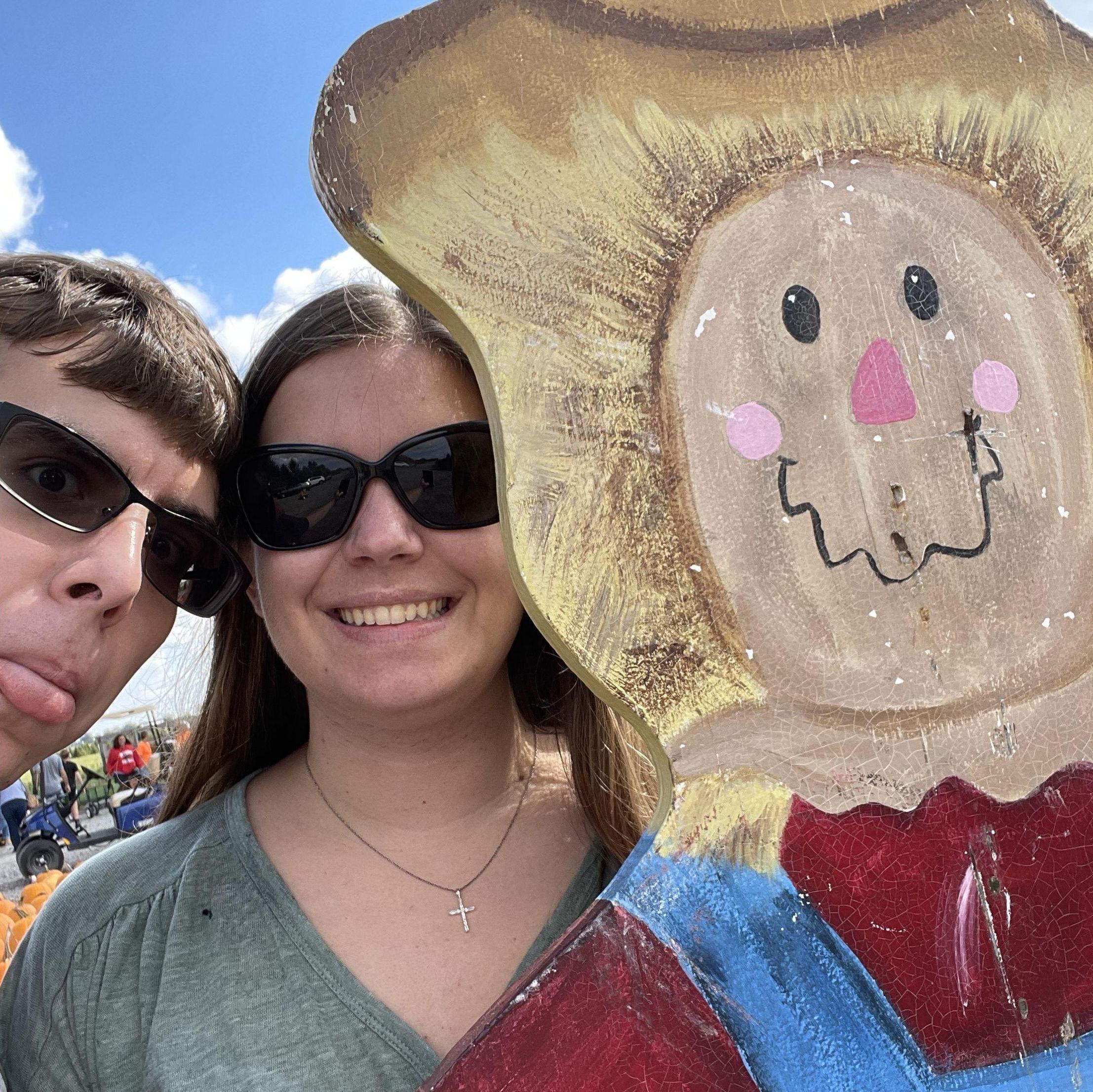 Pumpkin picking with our good friend the scarecrow.