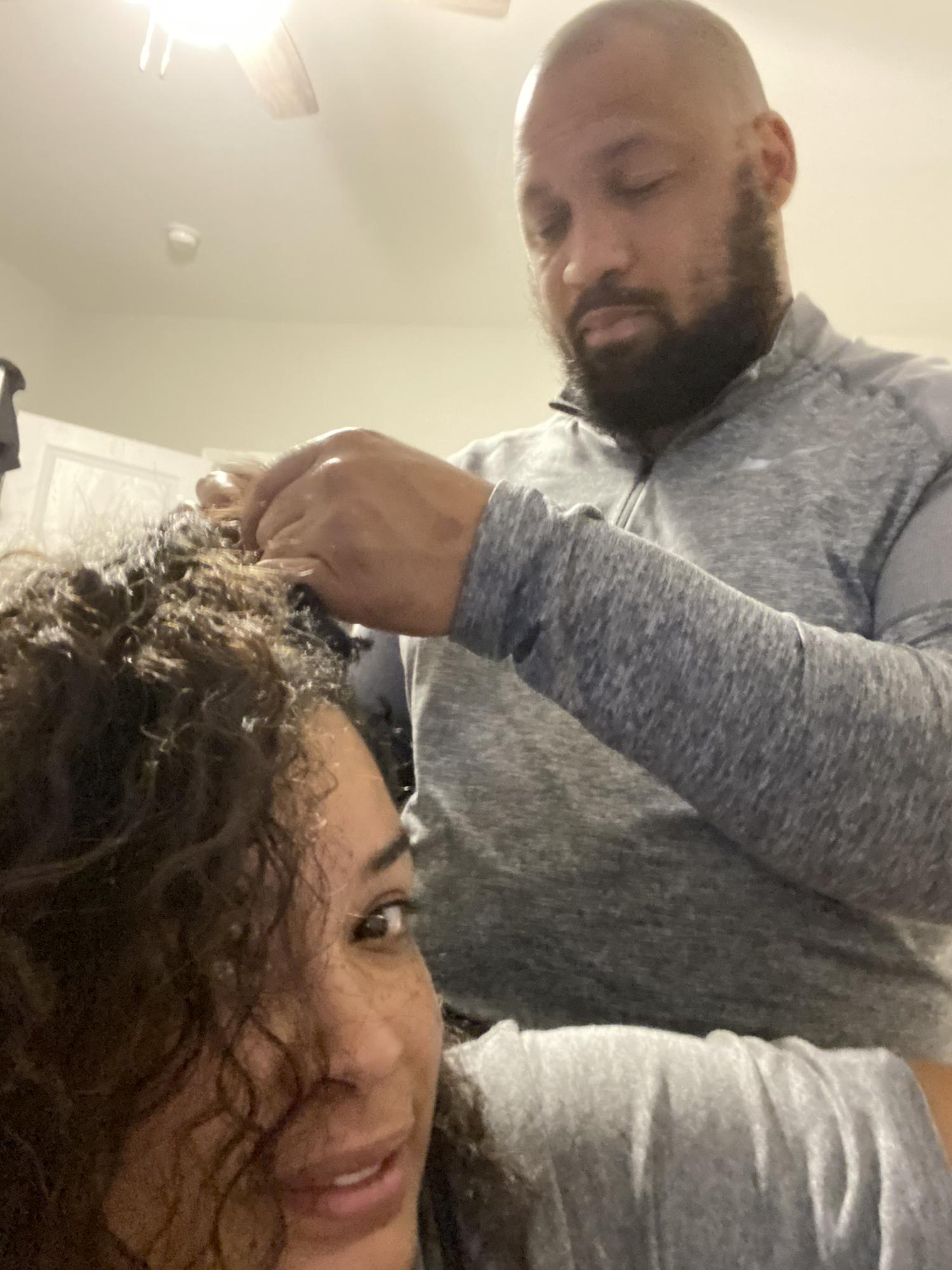You know it's love when he helps take the braids out