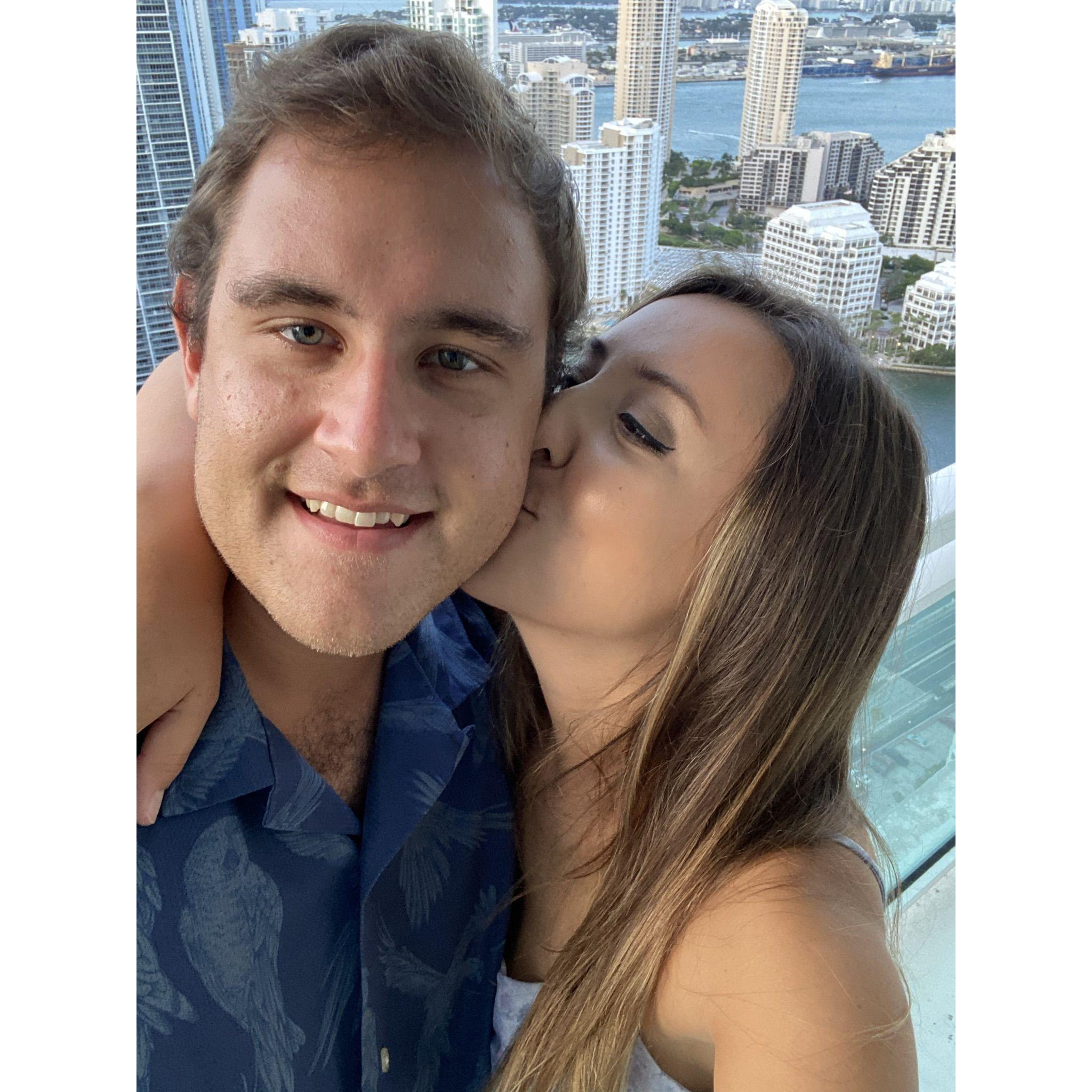 The two share one of their final kisses from the Brickell apartment balcony before moving out and setting their sights on their next adventure!