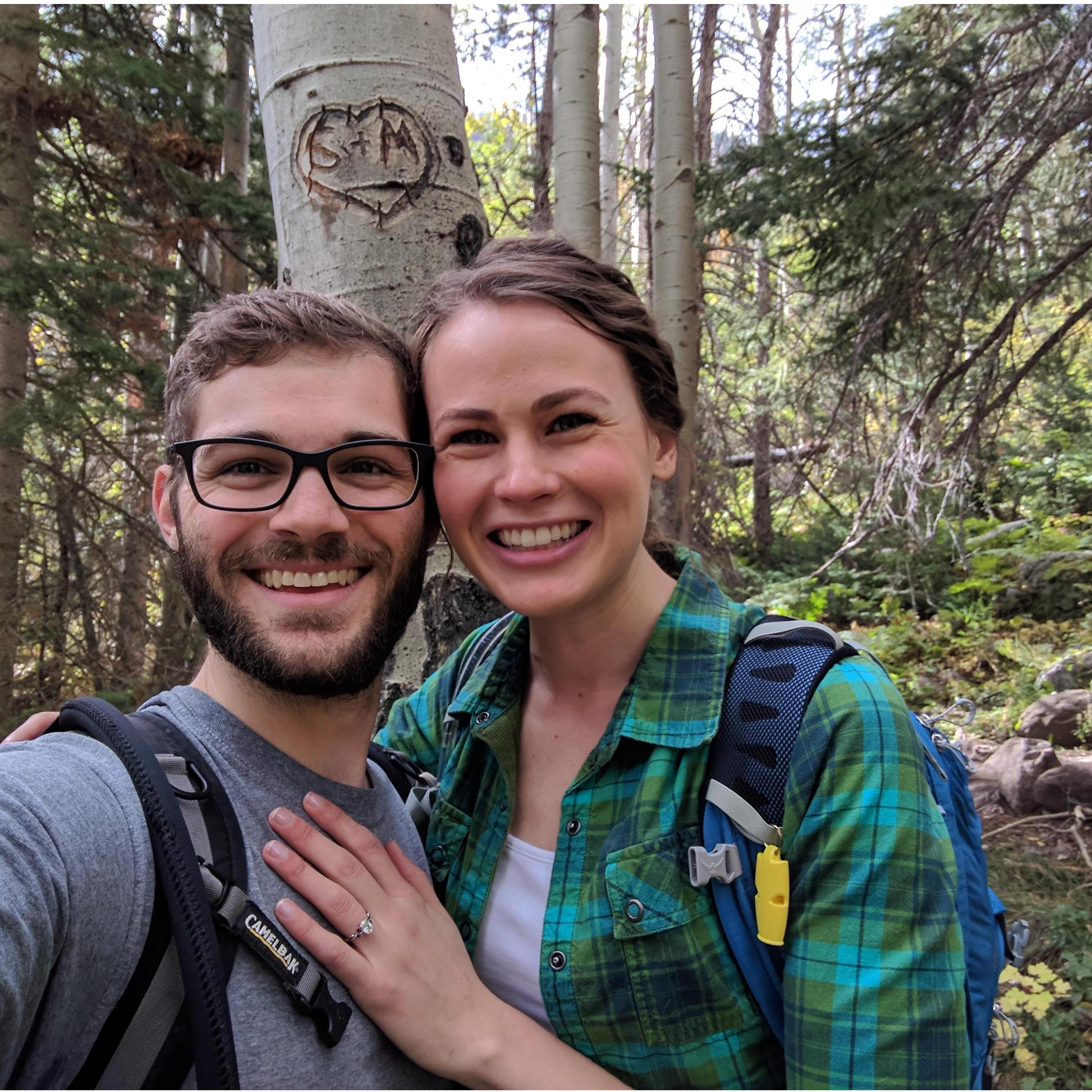 Where we got engaged! We carved our initials into this tree in RMNP 4 years ago, we went back to find it and Mason proposed!