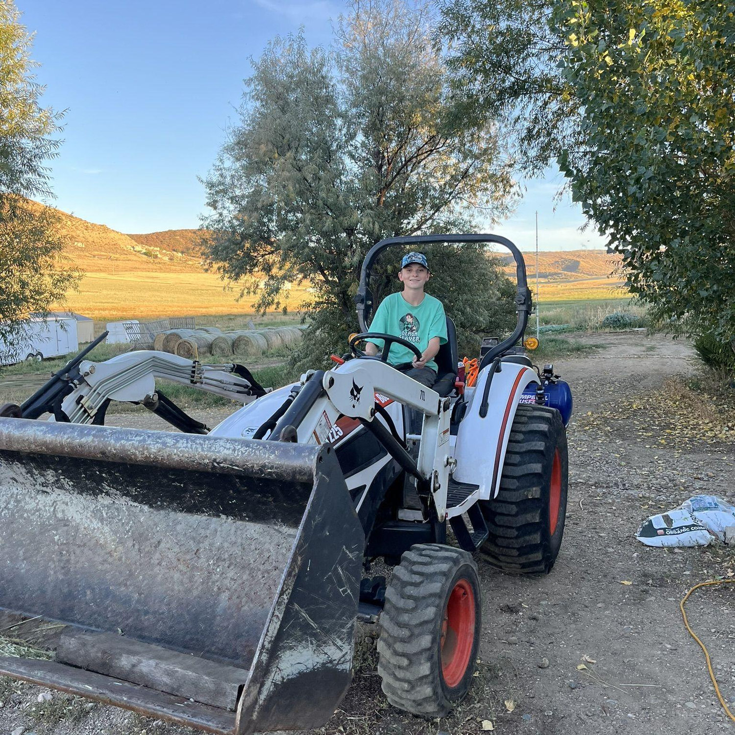 Tyler on the tractor.