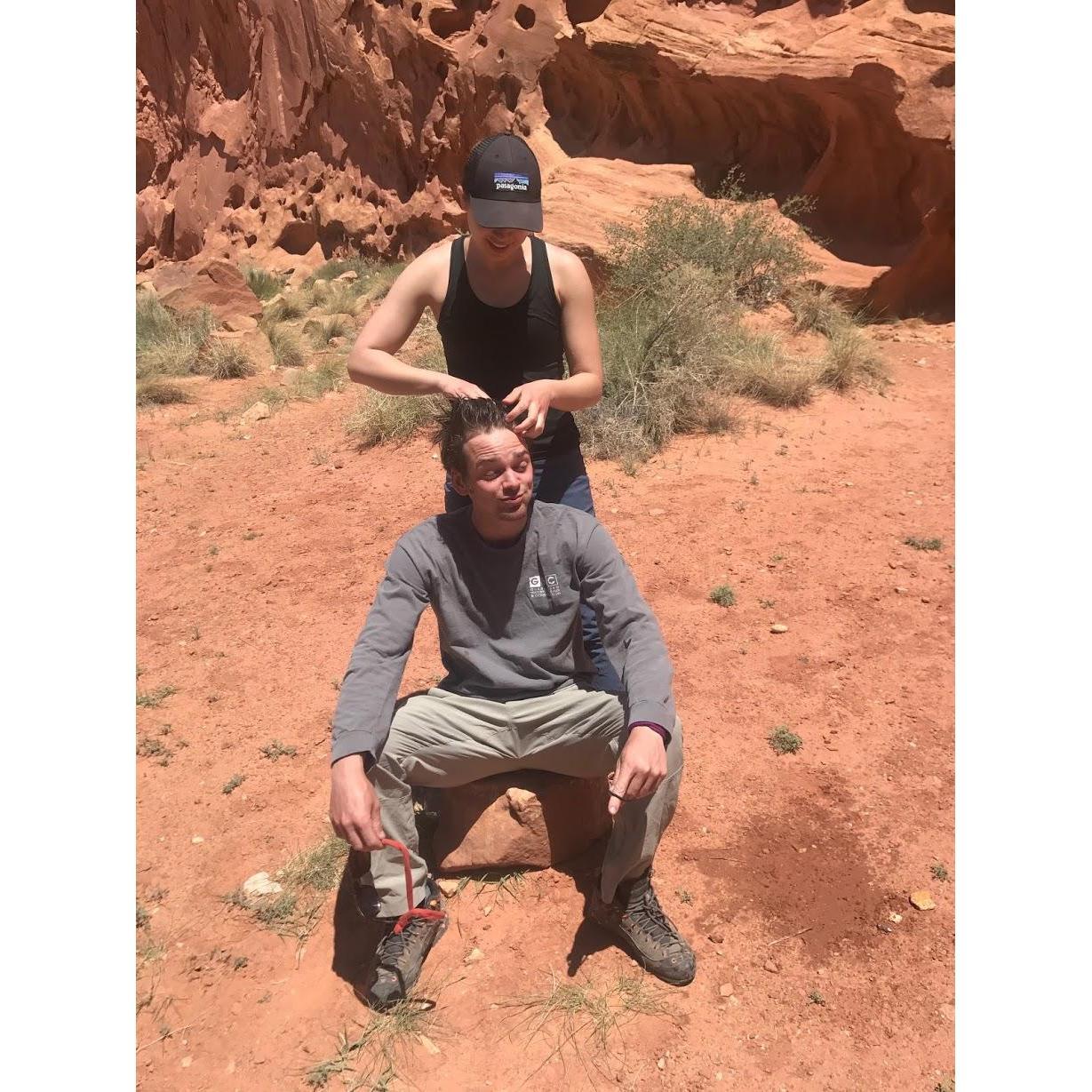 Braiding Jared's hair, Capitol Reef 2017