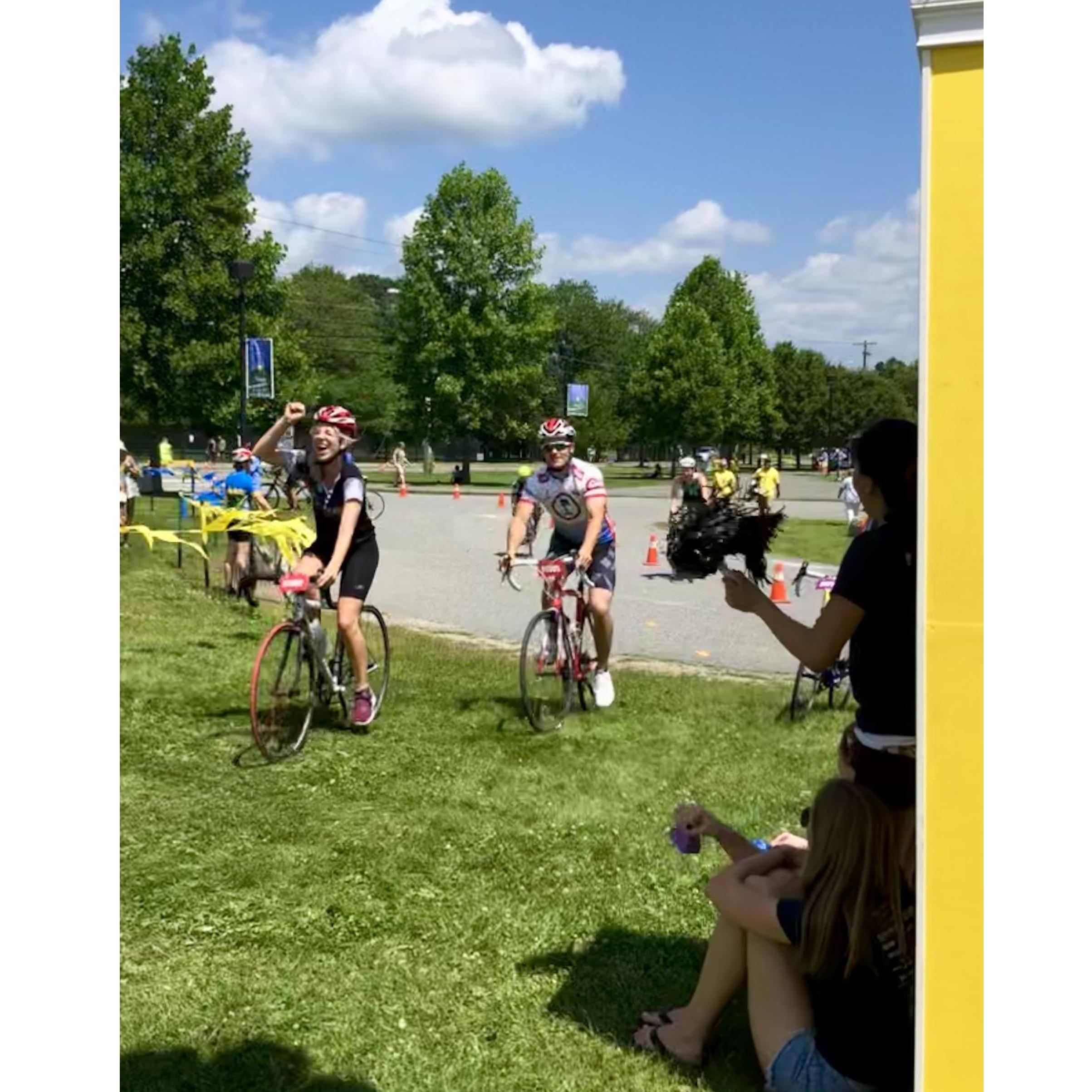 Crossing the finish line after a 50 mile bike ride together!
