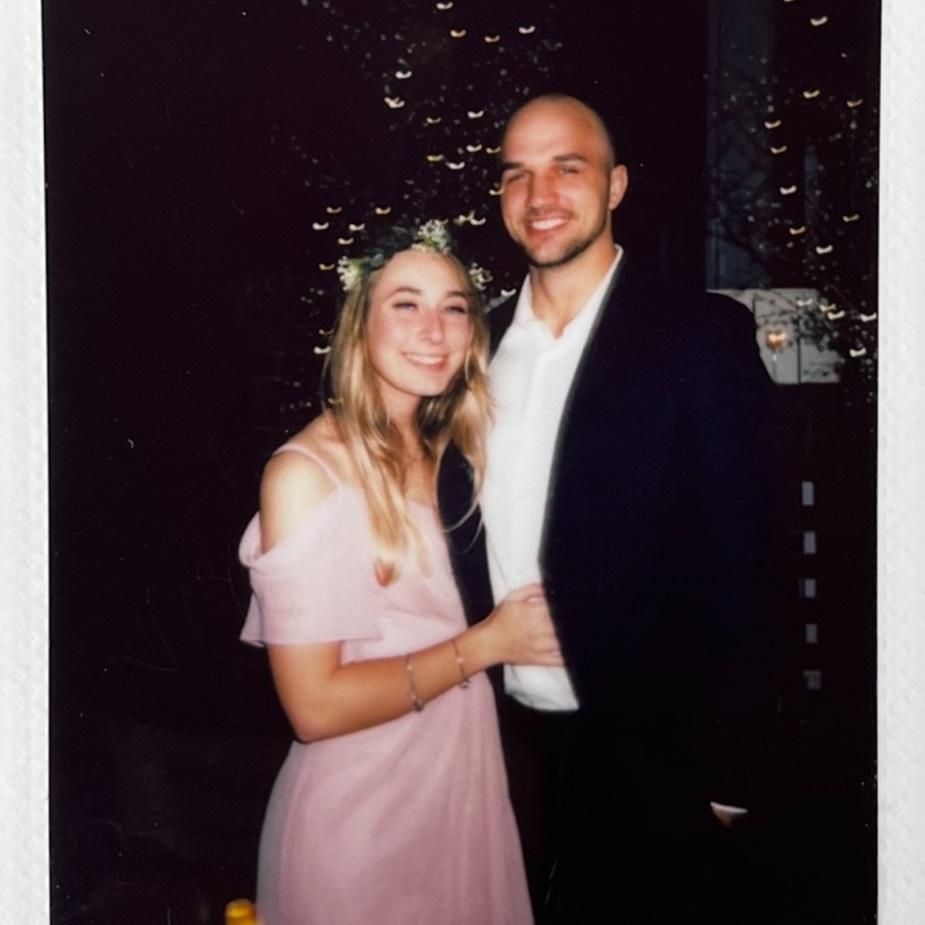 The first picture we ever took together <3 a polaroid taken at a friend's wedding