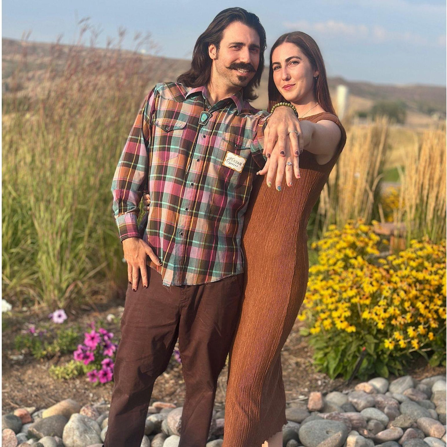 They're engaged and proud to show it off!