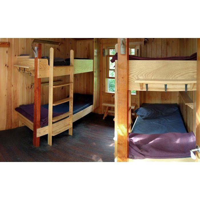 Inside a Bunk Room // each bunk comes with three wool blankets and a pillow. There are lights next to the head of each bunk.