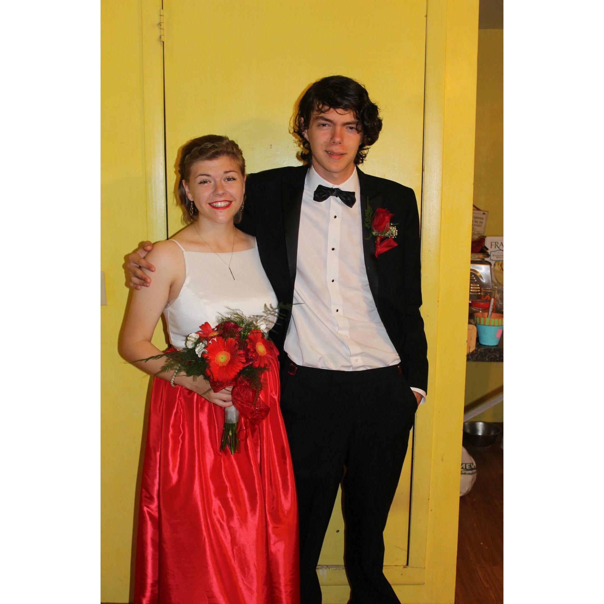 This was our first photo together! Ethan took Penelope to prom her senior year. We dont know why we chose to take our only prom photos in my moms bright yellow kitchen but 🤷🏼‍♀️