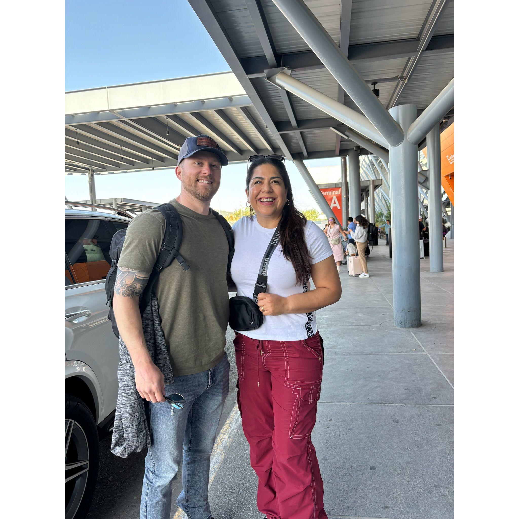 Ryan and his mother in law at the airport. After our Mexico trip.