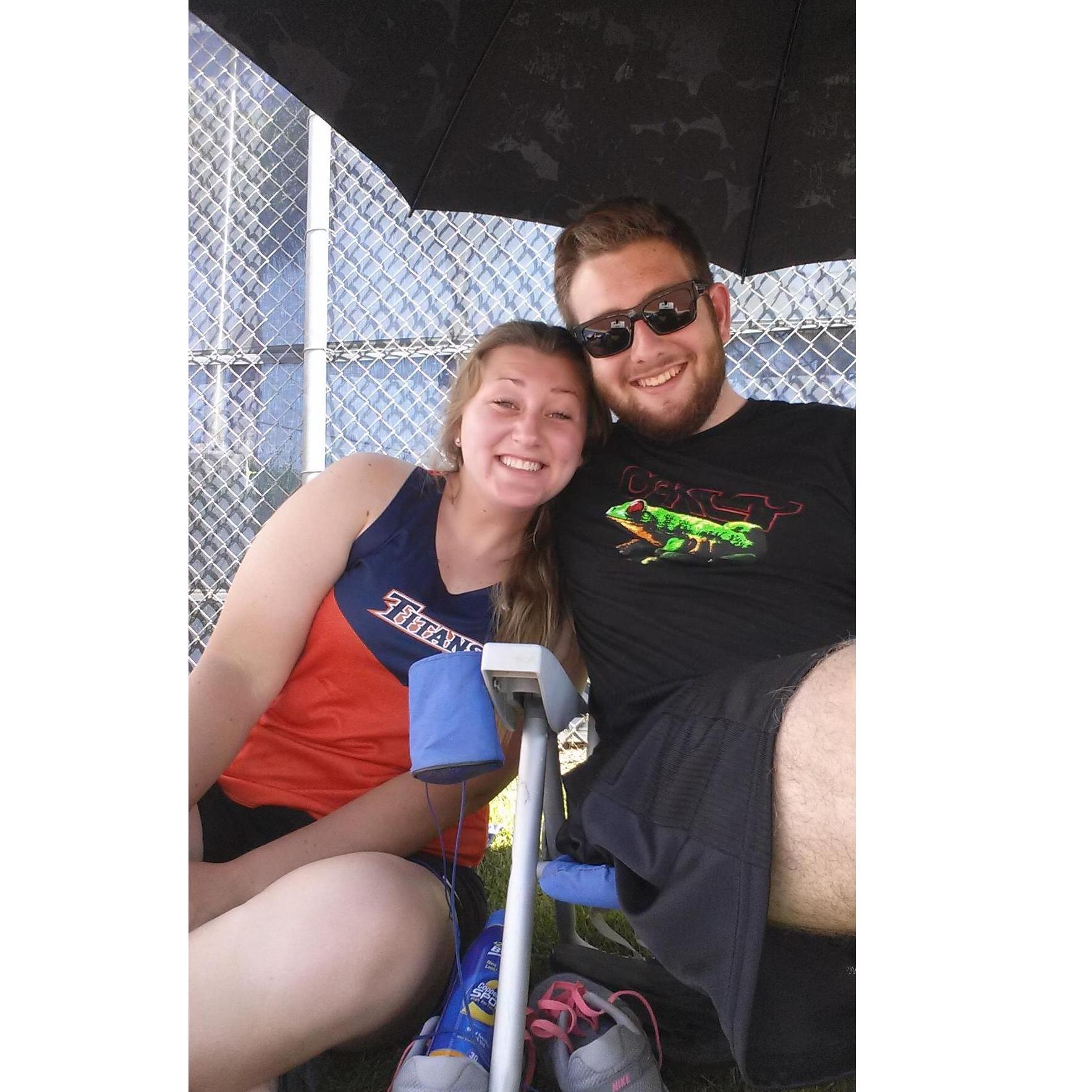 Poor Aaron used to sit in the blazing sun every weekend at Hannah's college track meets