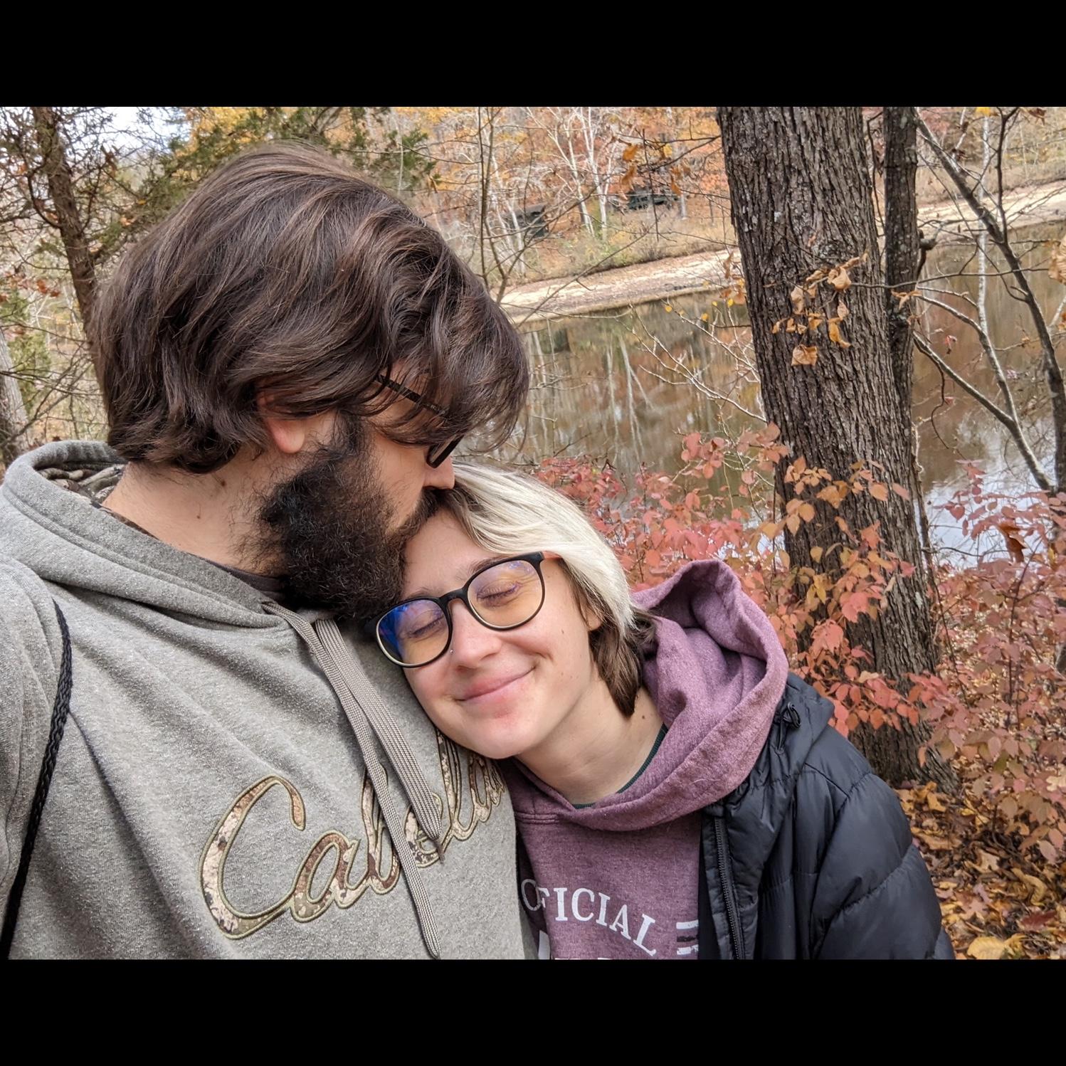 Pausing for pictures on Krista and Dalton’s favorite hiking trail around Lake Cammack in Burlington, NC, Fall 2023