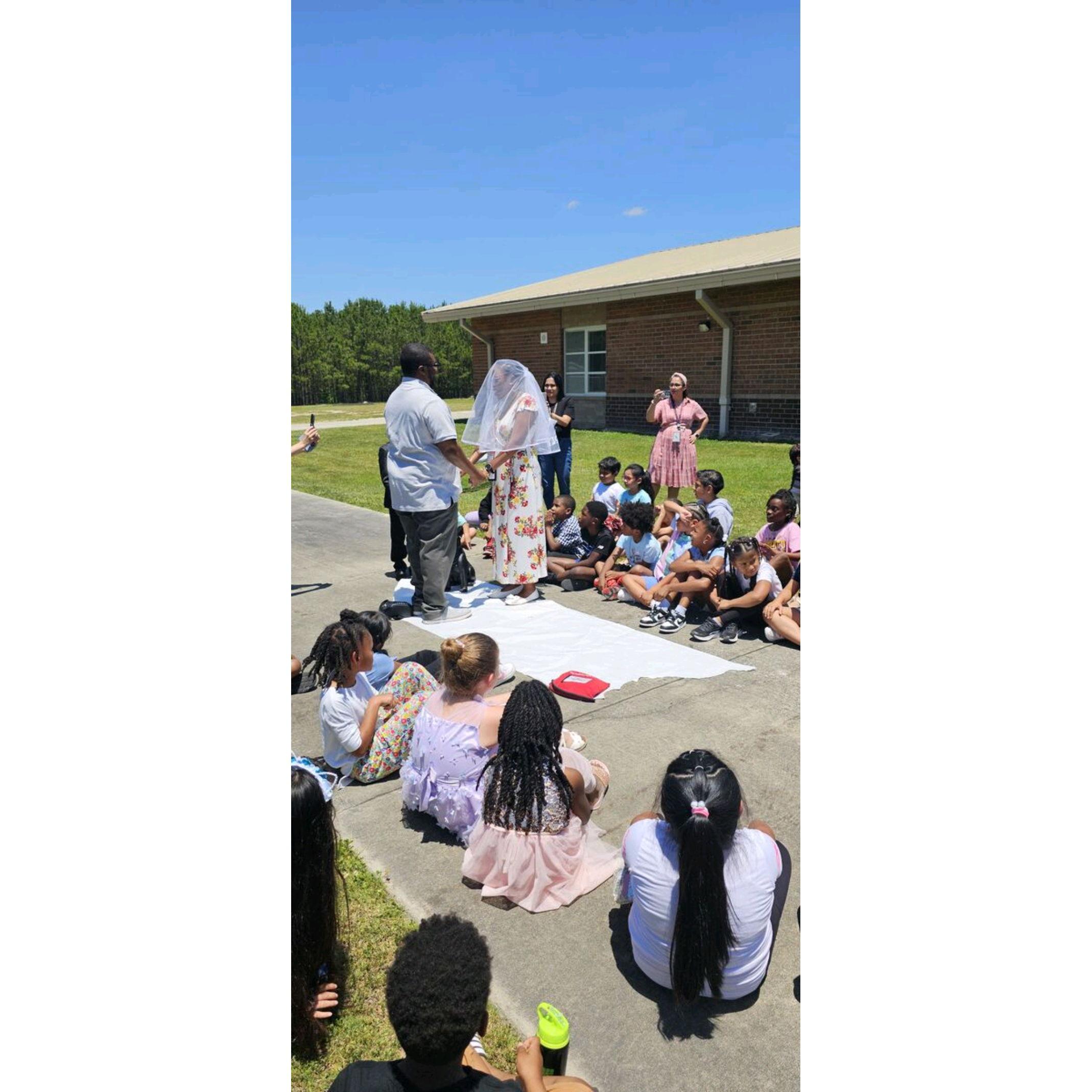 Tiffany's class insisted on having a school wedding.