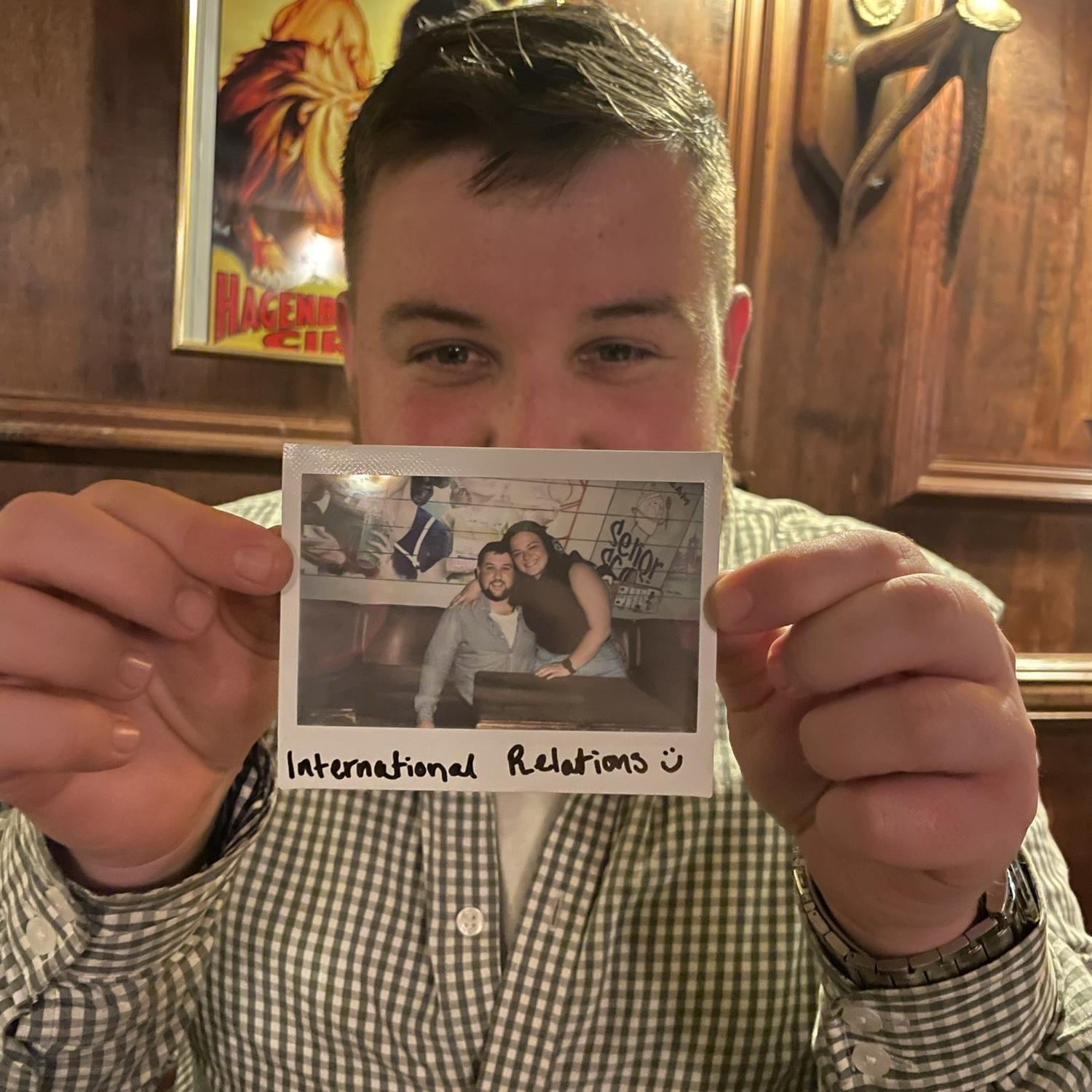 Second or third date at our favorite cocktail bar. They stick polaroids on the ceiling. Have yet to find it though.