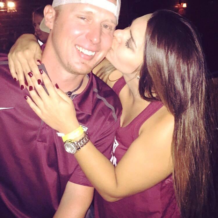 A smooch after a Fightin Texas Aggie win!