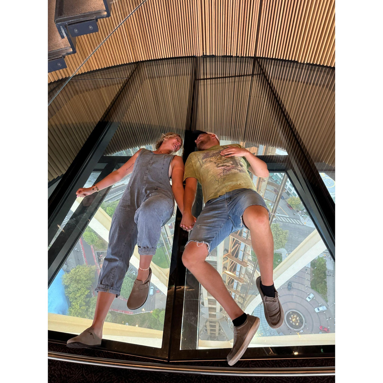 This picture was the scariest thing we have done. laying on glass 1,000's of feet in the air on a windy day
