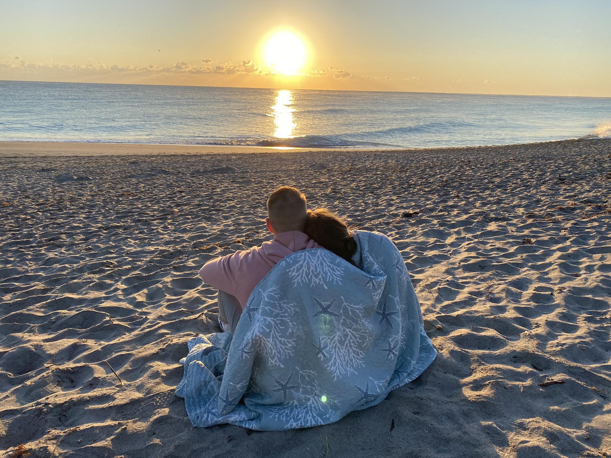 They woke up early the next morning and made their way down to the beach to share the vows they had written for one another and to watch the sunrise...