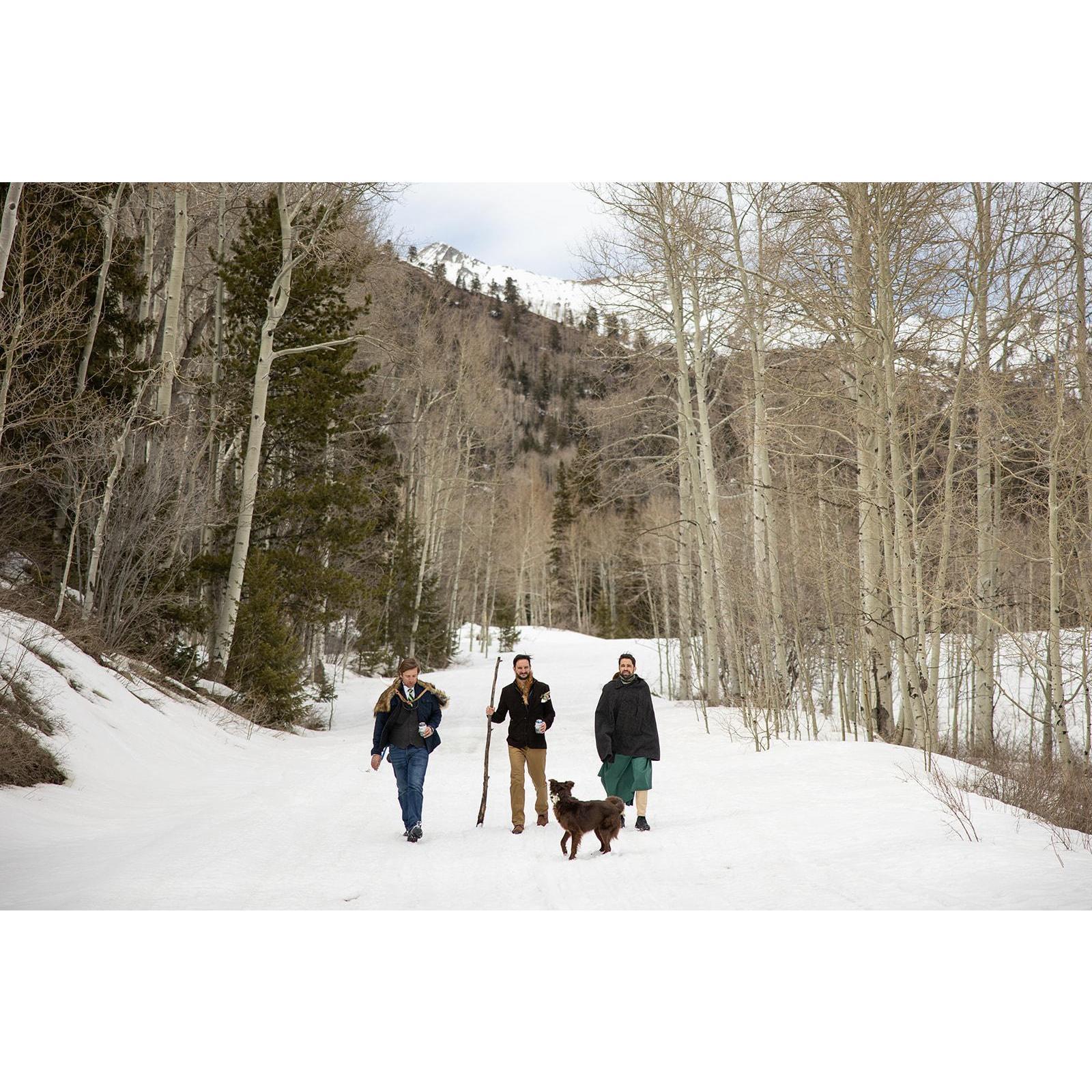 Scott, Hayes, Jamie, and Winnie walking down to the ceremony
