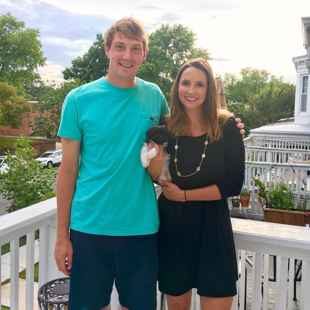 New parents to Millie at their apartment in the Museum District.