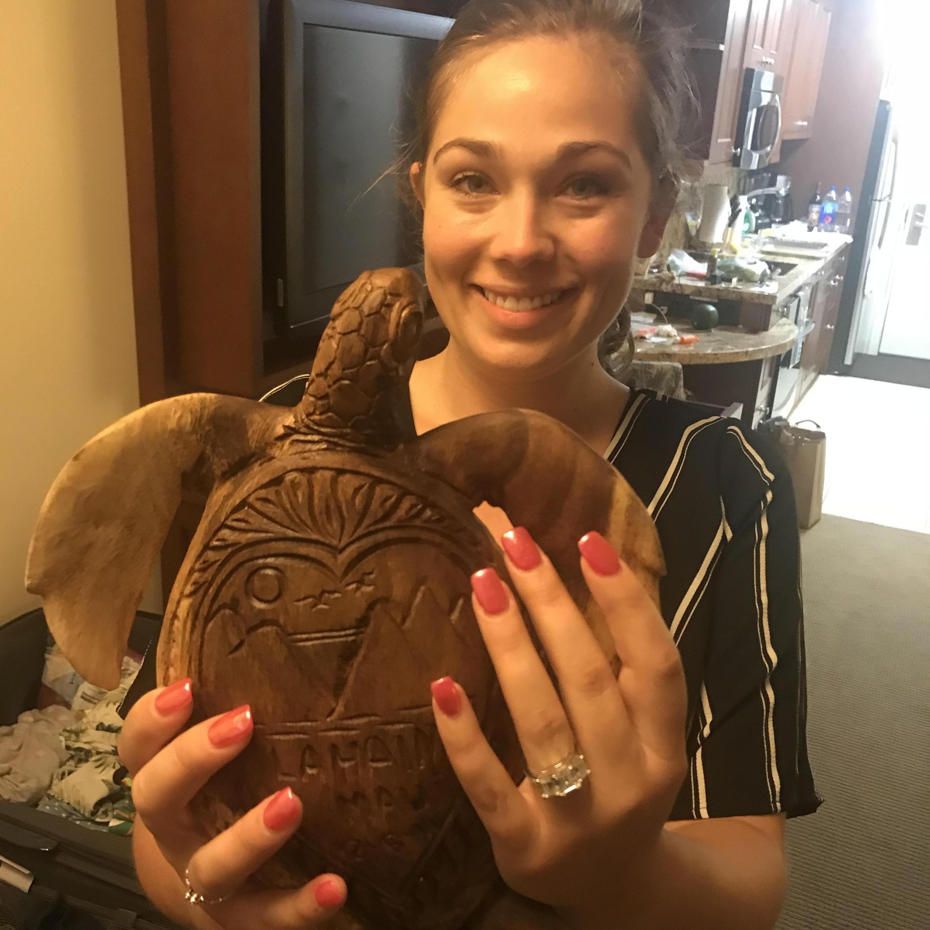 Our Hand carved turtle with the story of our engagement on the shell!