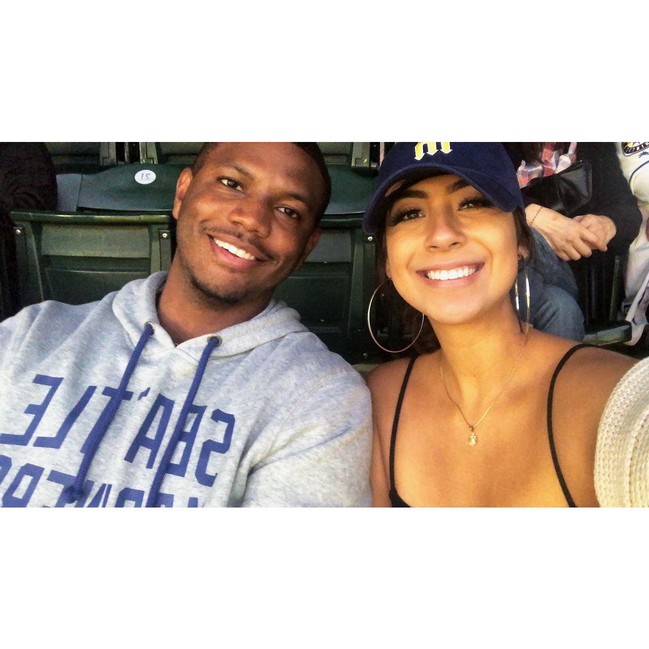One of our first dates in Seattle. Yes.. I convinced him to blend in as a Mariners fan. LOL