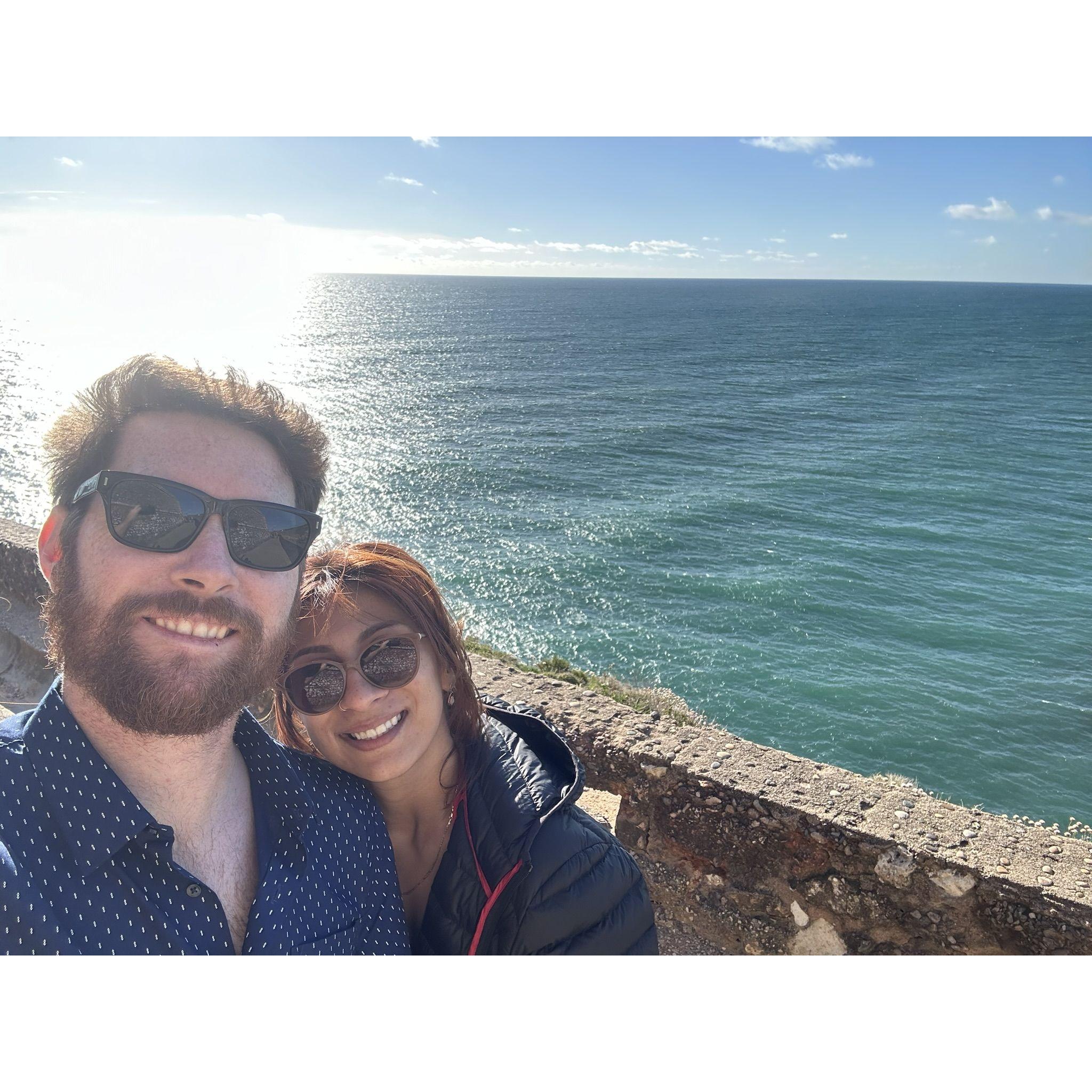 Our first pictures as fiancés by the lighthouse in Nazaré