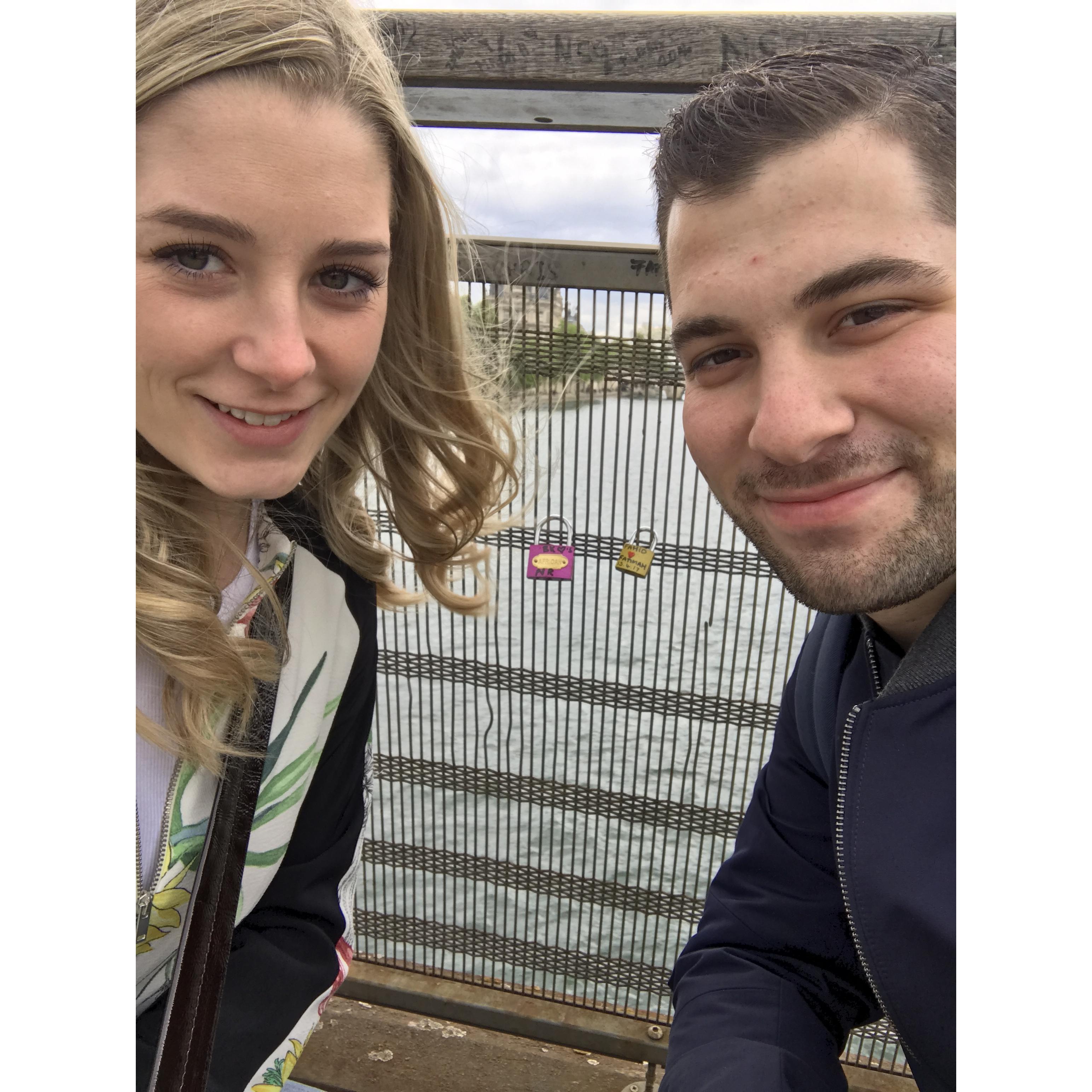 Locking our love on the Pont des Arts in Paris