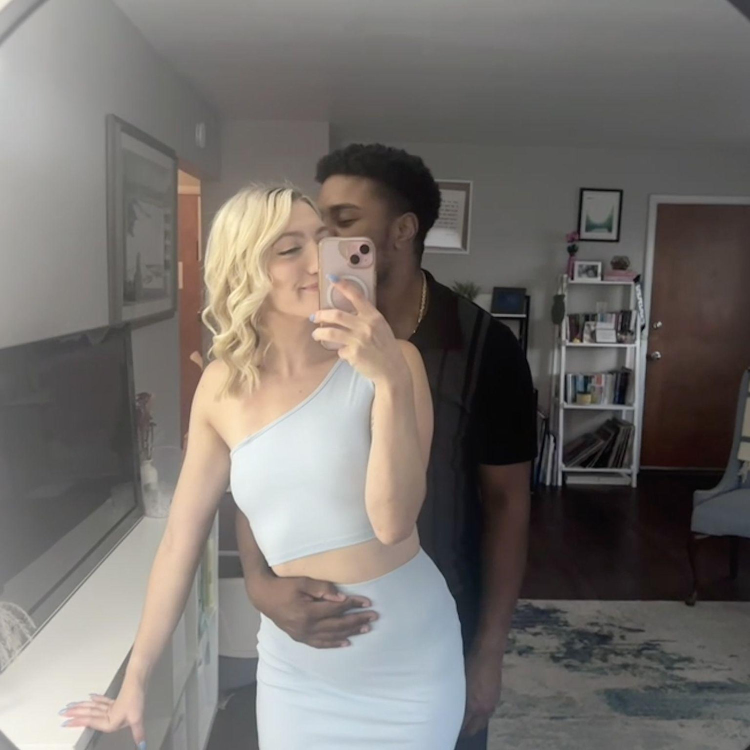 Their first of many mirror-pic photos before date night.