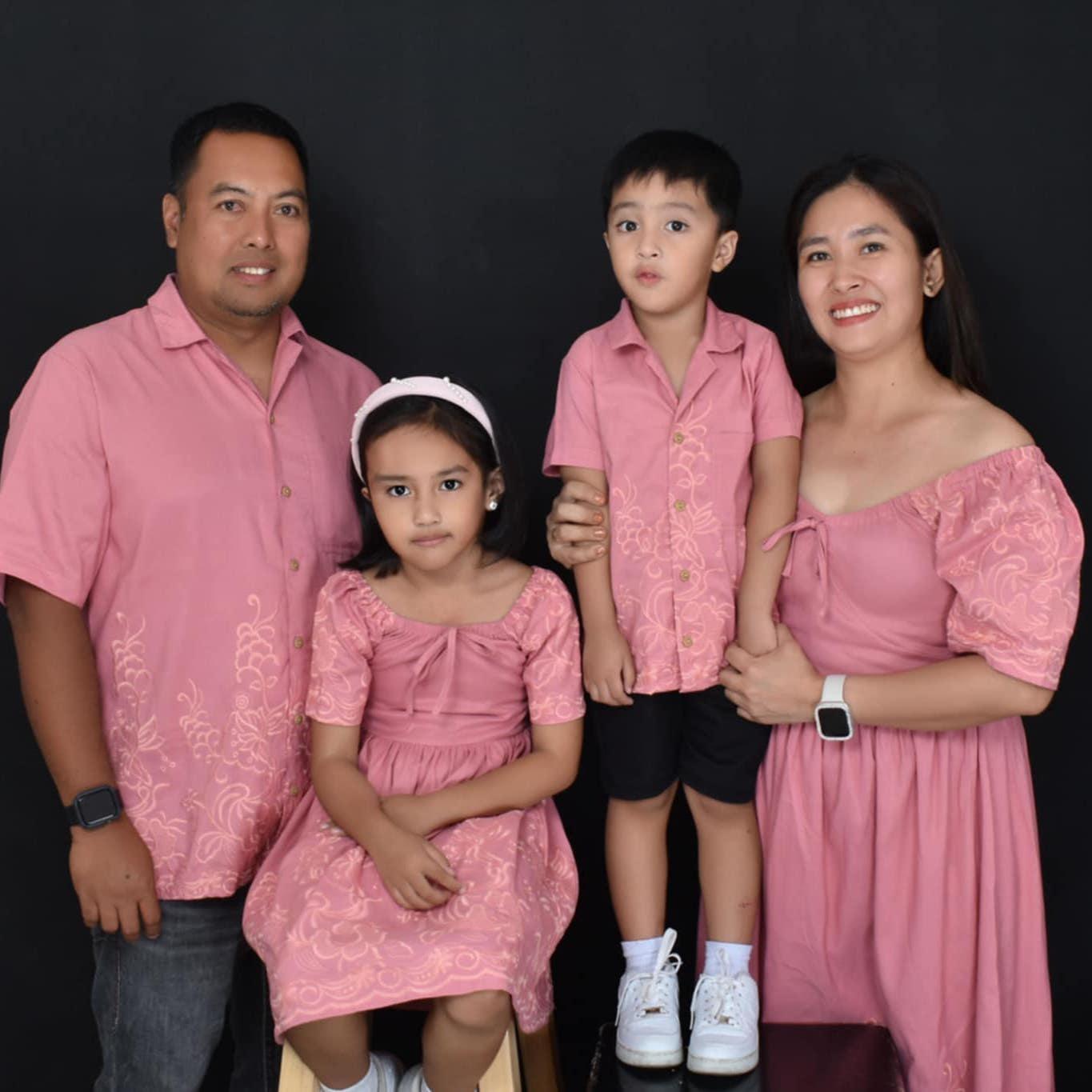 Wilbert, with his wife and their kids, Andrea and Willard.