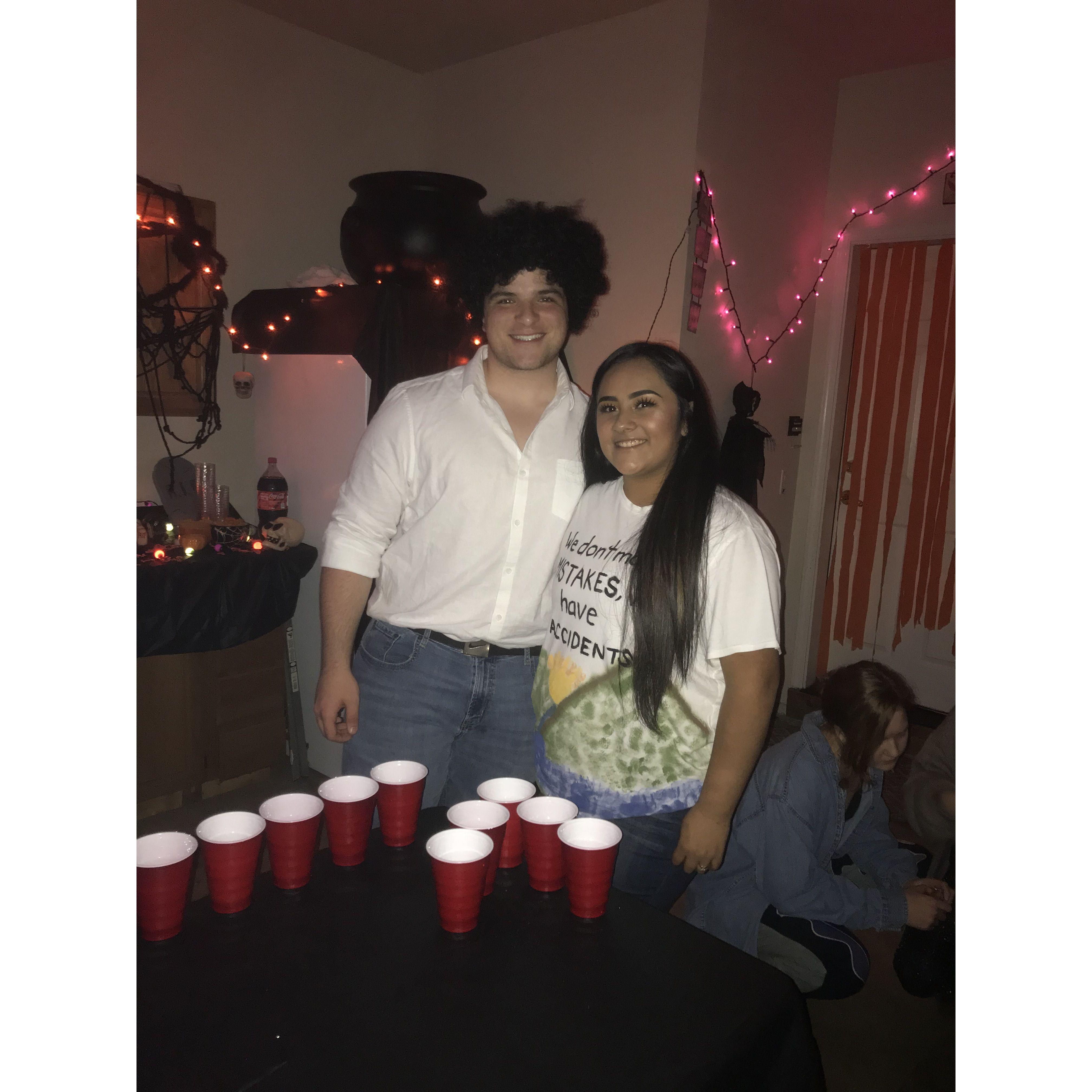 Our first Halloween dressing up. Dom is Bob Ross and I was his painting.