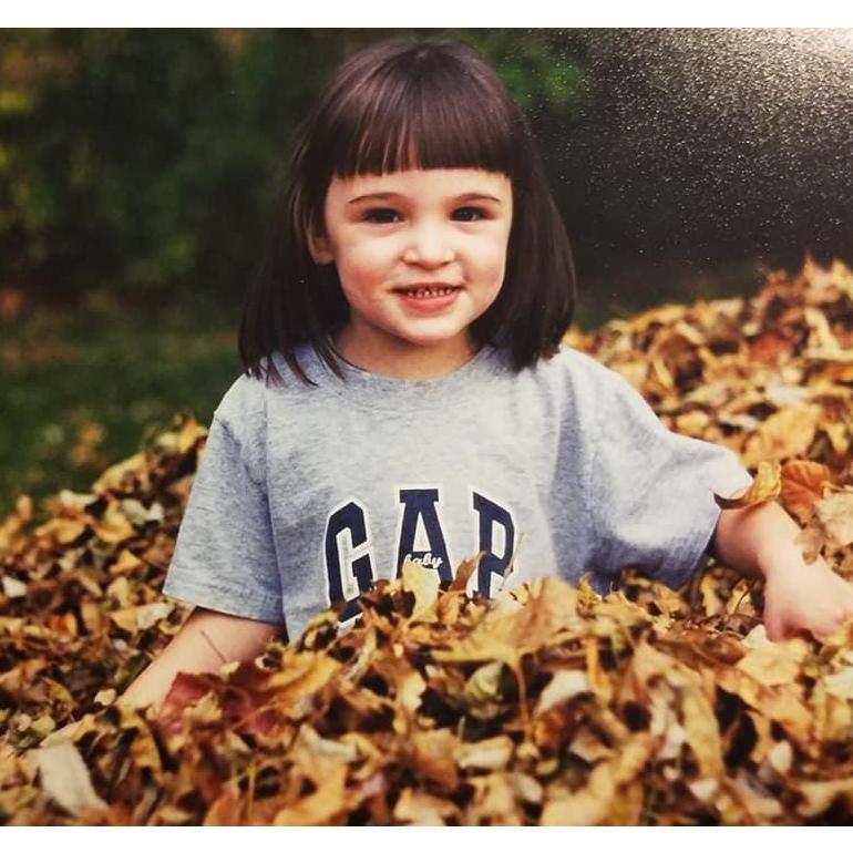 Itty bitty Izzy at about the same age. Wow... they both rocked the super short bangs....